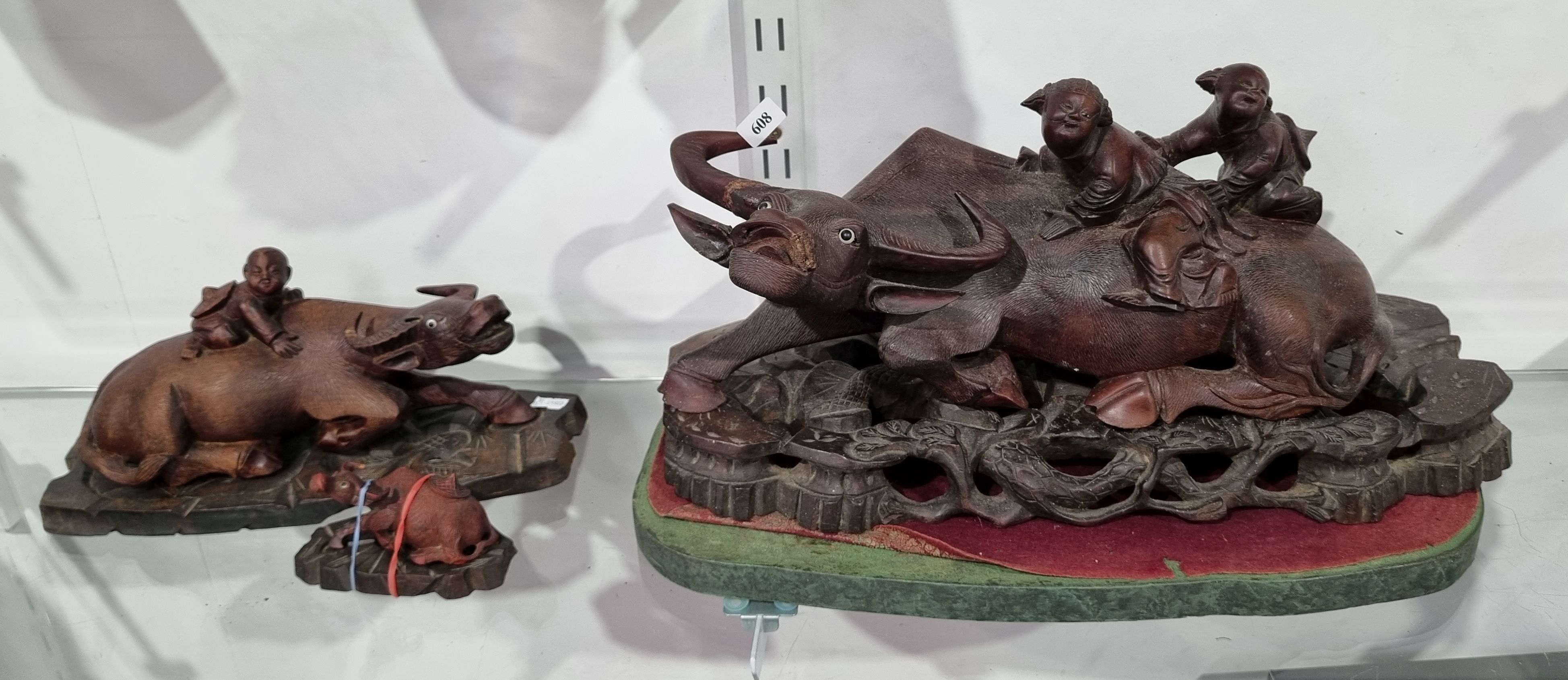 608 · THREE CHINESE CARVED WOODEN FIGURES