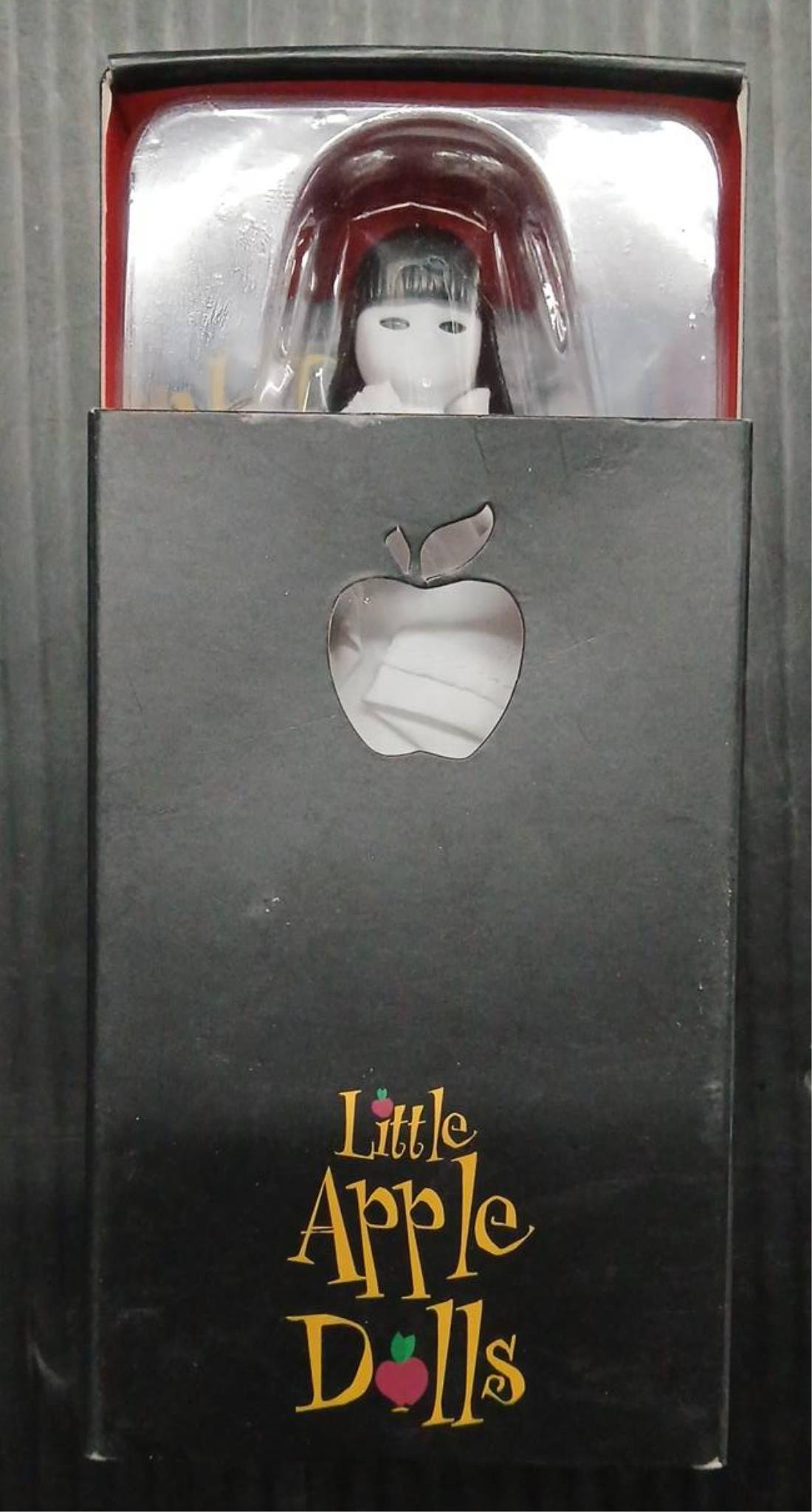 Three Little Apple Dolls in Boxes | Lightning Auctions Inc