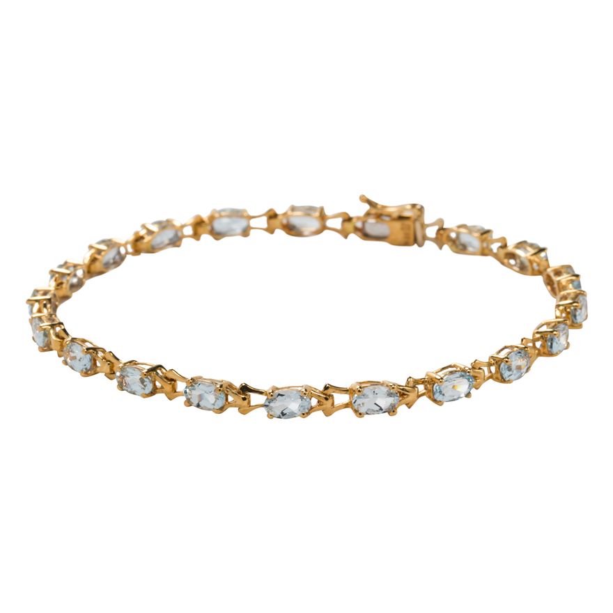 An aquamarine and 18k gold link bracelet