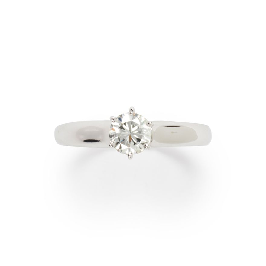 A diamond and fourteen karat white gold ring