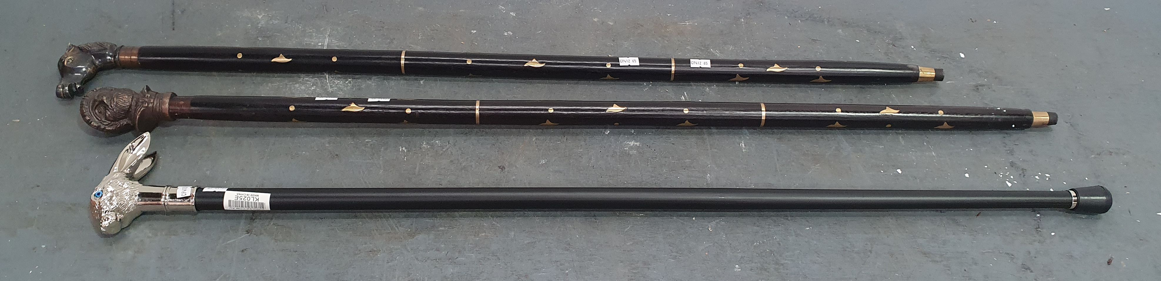 1395 · THREE VARIOUS WALKING STICKS