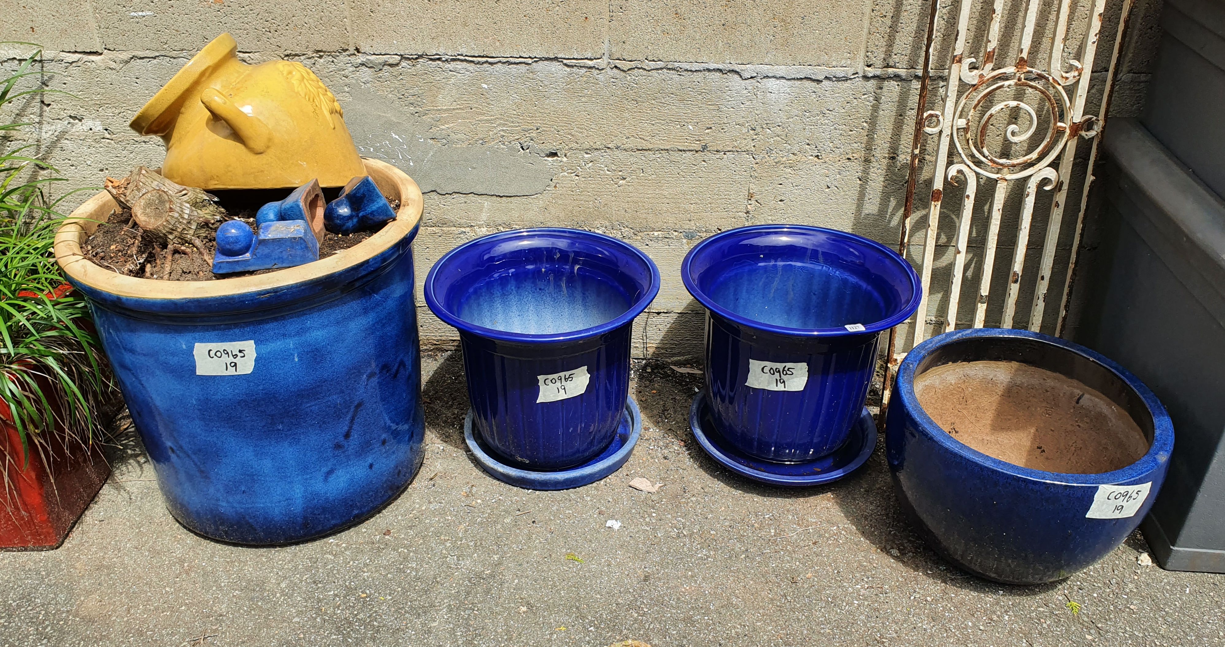 1127 · FIVE GLAZED PLANT POTS