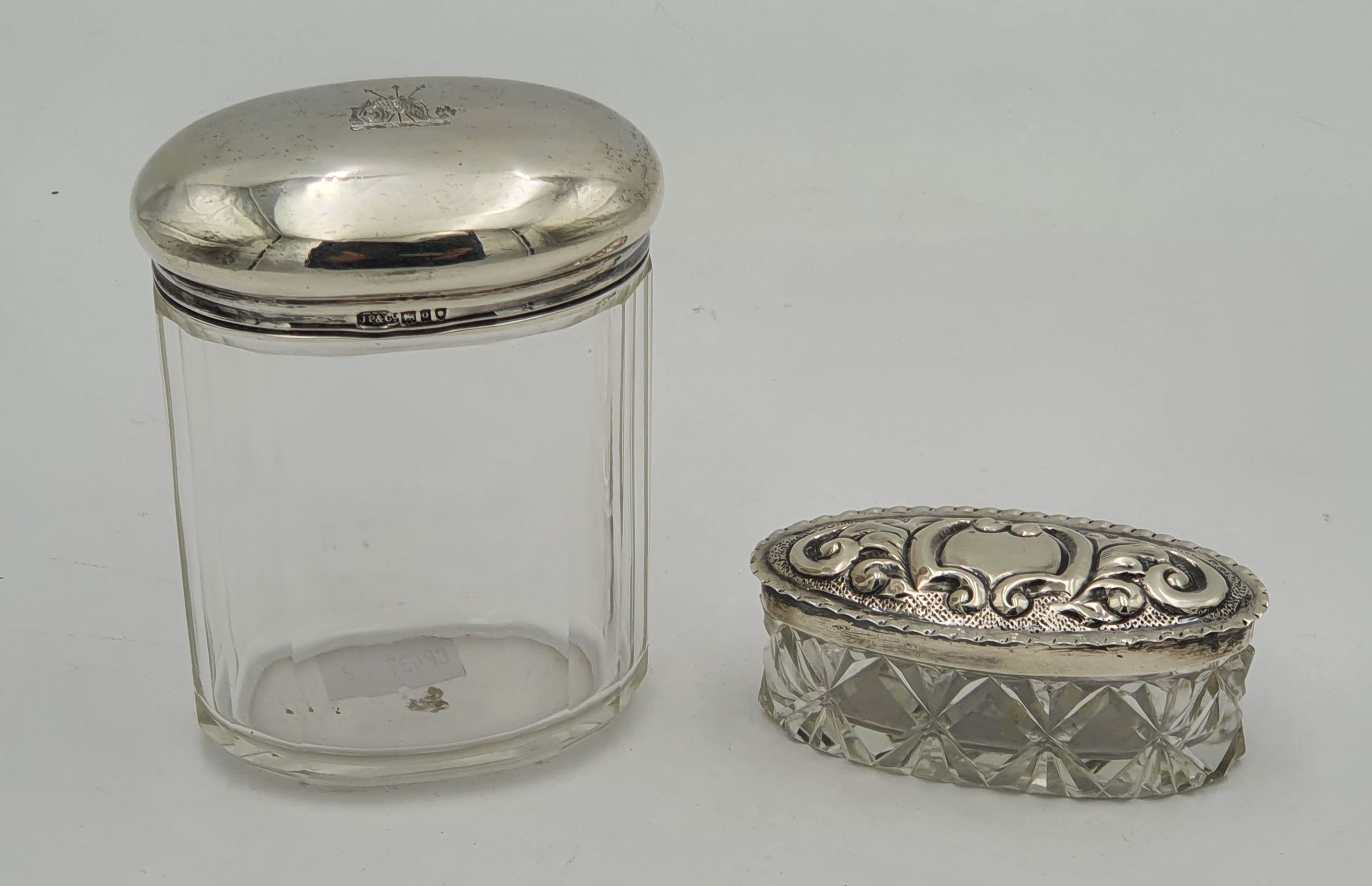 540 · TWO DRESSING TABLE JARS WITH SILVER TOPS