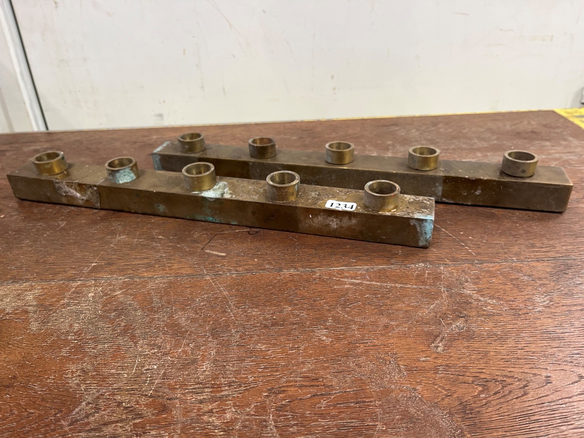 A Pair Of Brass Candle Holders