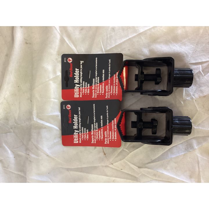 Buying (2) Red Devil Utility Holder