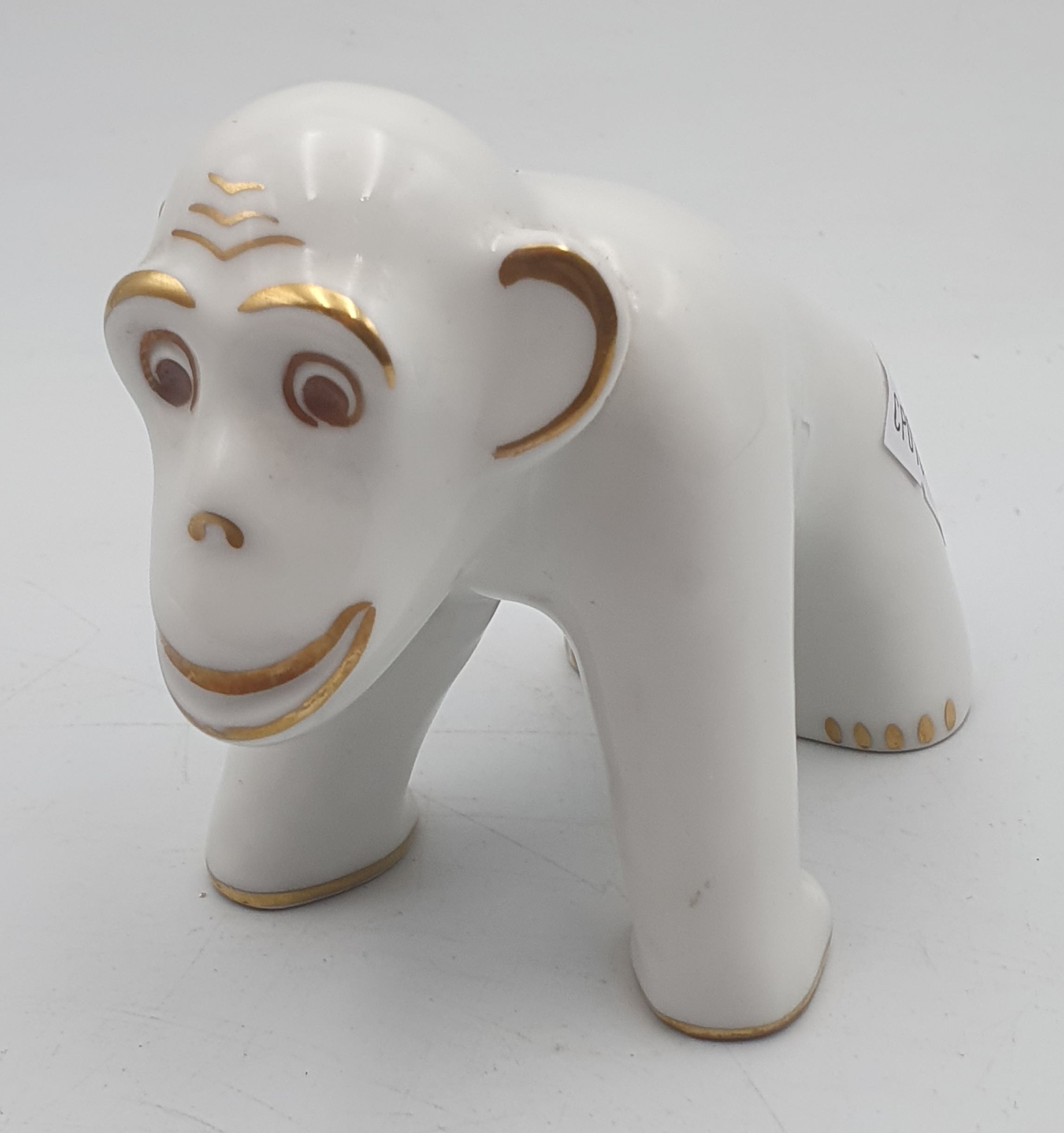 88 · A GERMAN PORCELAIN GORILLA FIGURE