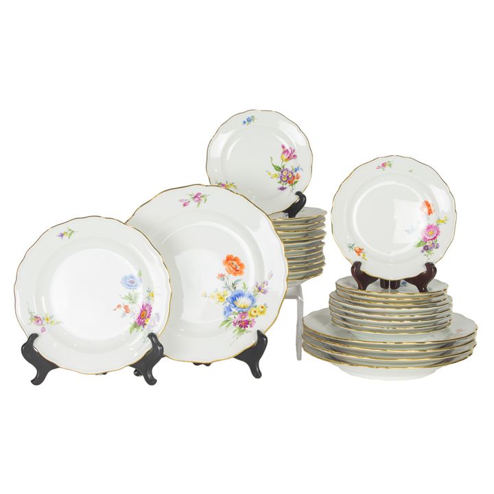 A group of Meissen floral decorated porcelain plates