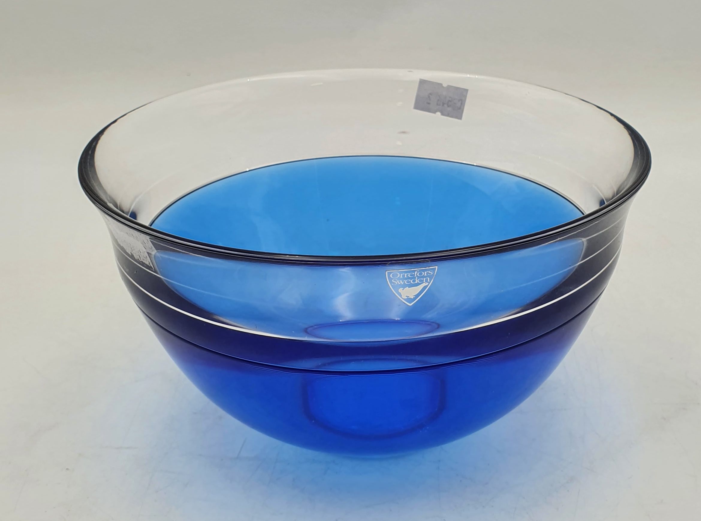 AN ORREFORS "NEPTUNUS" BLUE ART GLASS BOWL BY LARS HELLSTEN