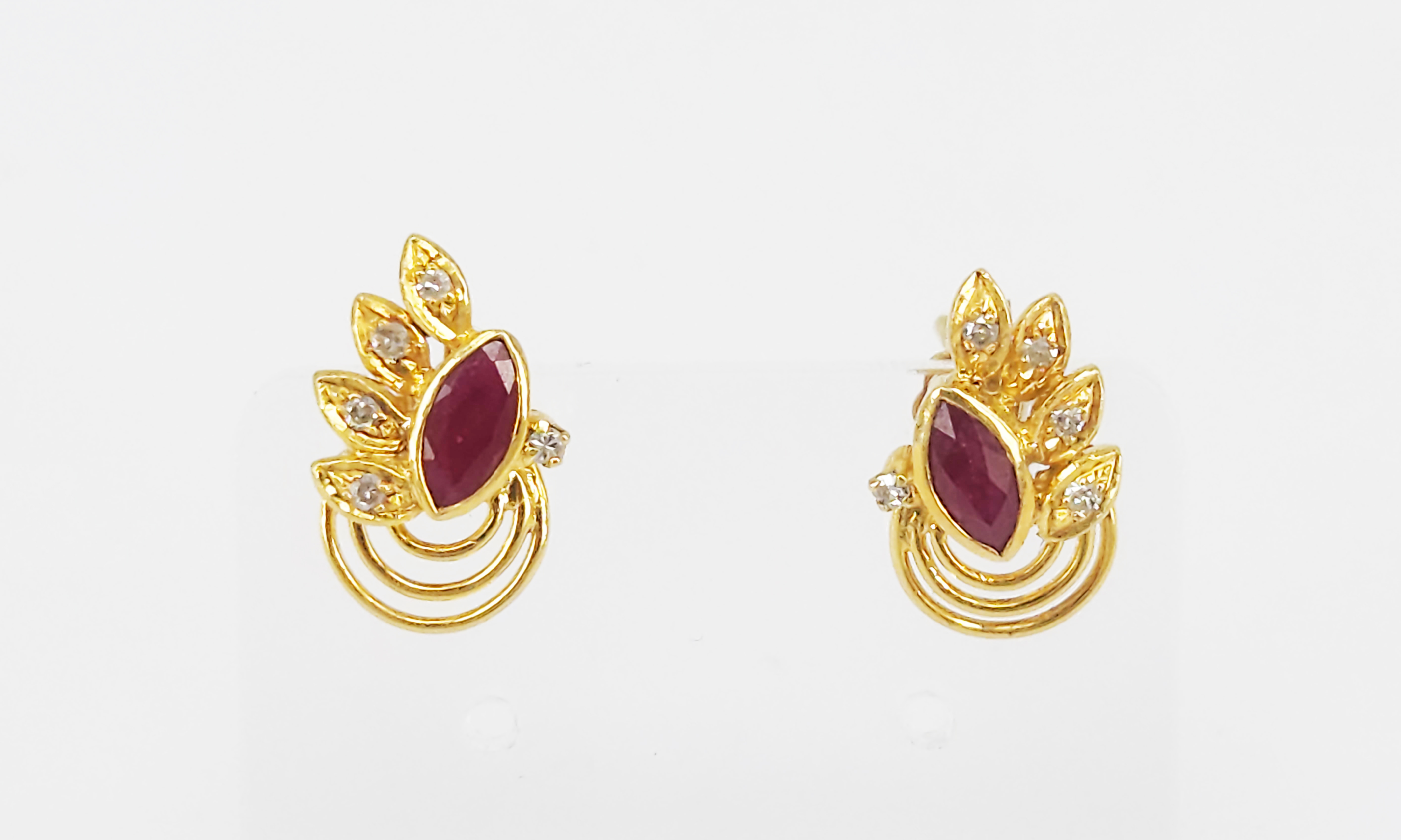 A Pair Of 18ct Yellow Gold Ruby And Diamond Earrings