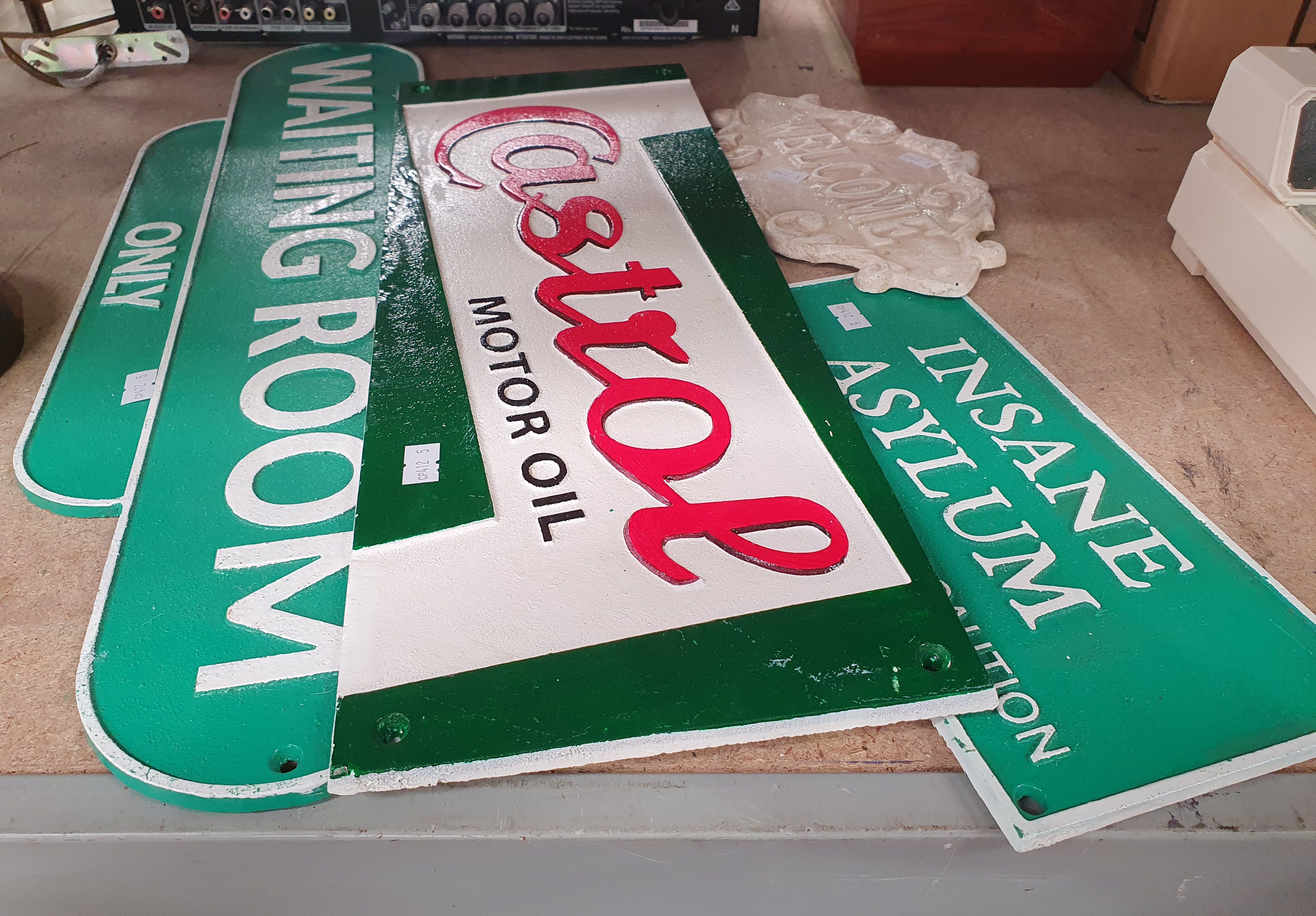 1273 · FOUR CAST IRON SIGNS