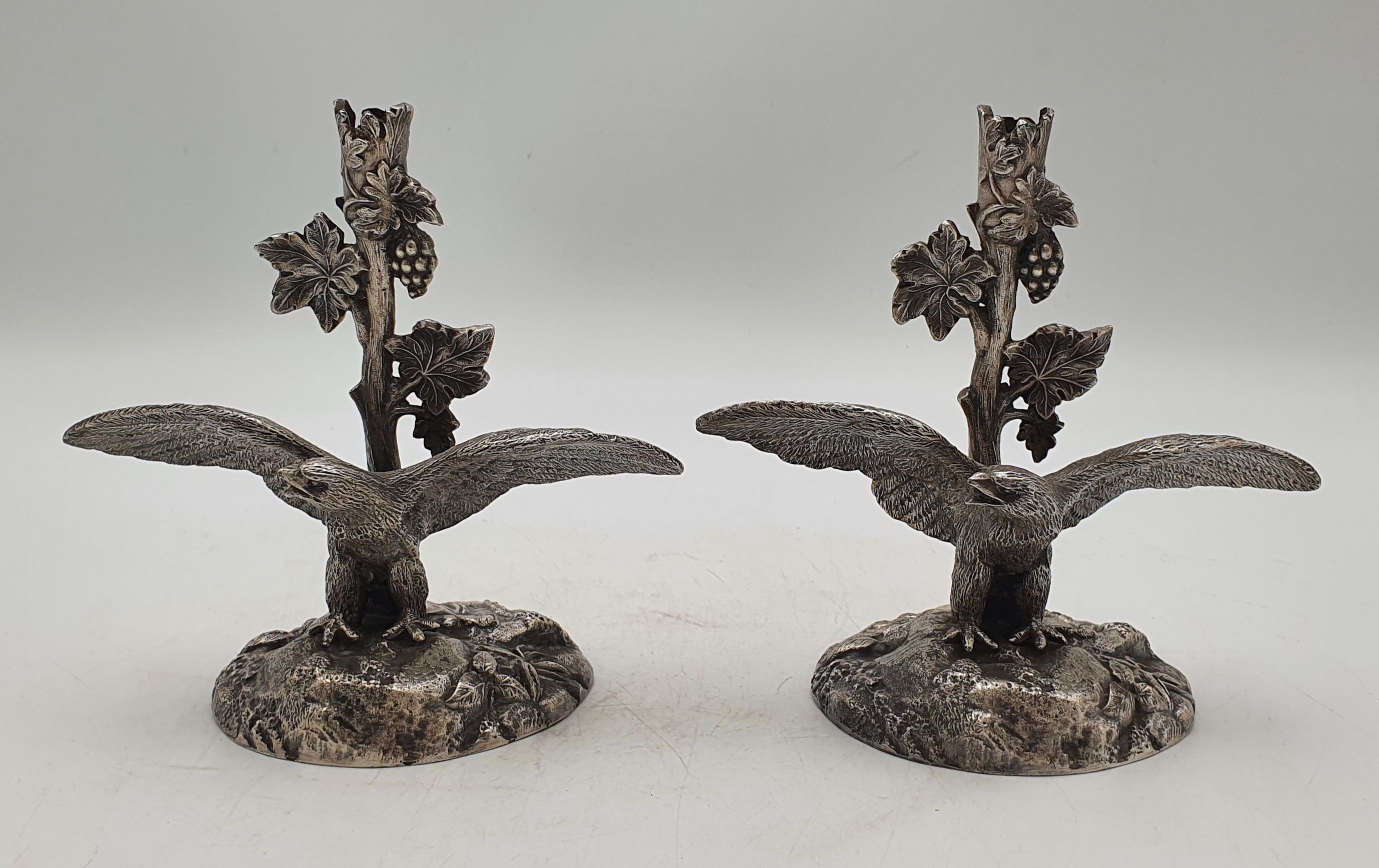 555 · A PAIR OF ART NOUVEAU PEWTER EAGLE EPERGNE STANDS