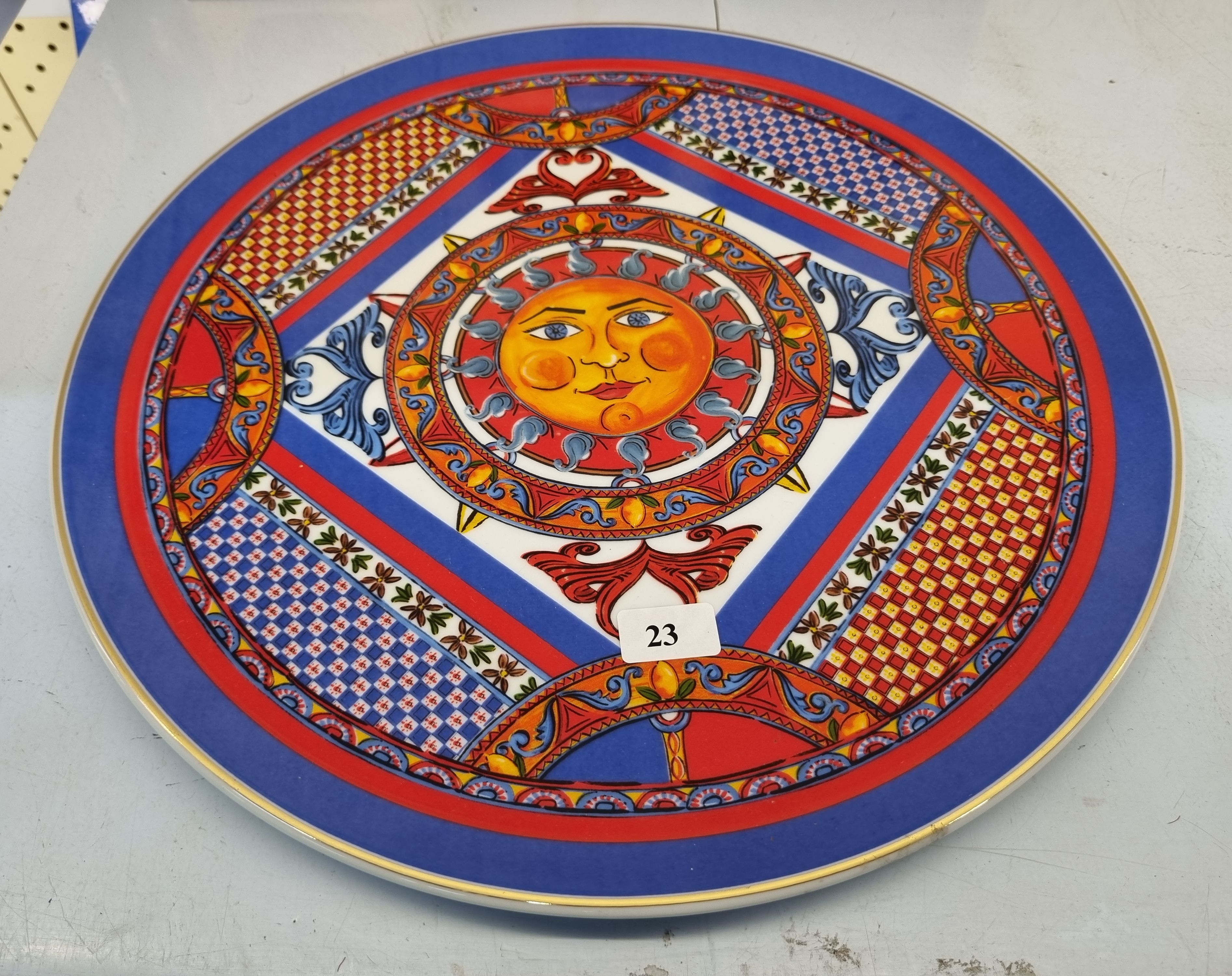 23 · A CONTINENTAL BACCI DESIGN PORCELAIN CHARGER
