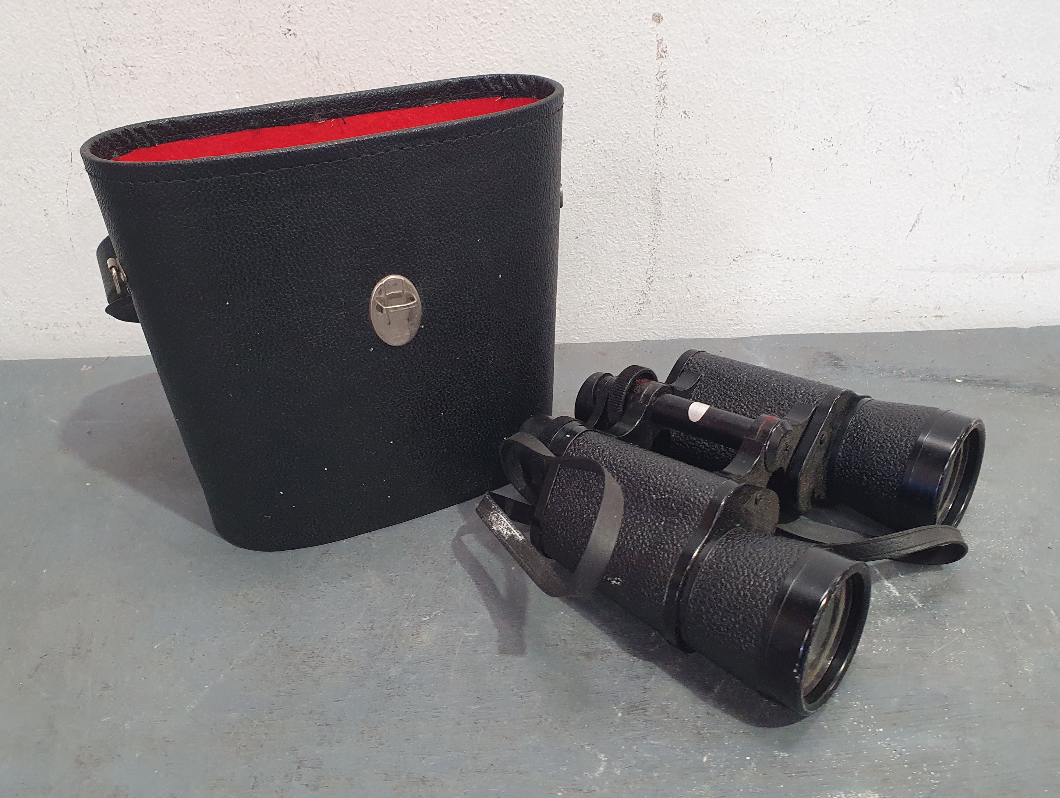 A PAIR OF BINOCULARS