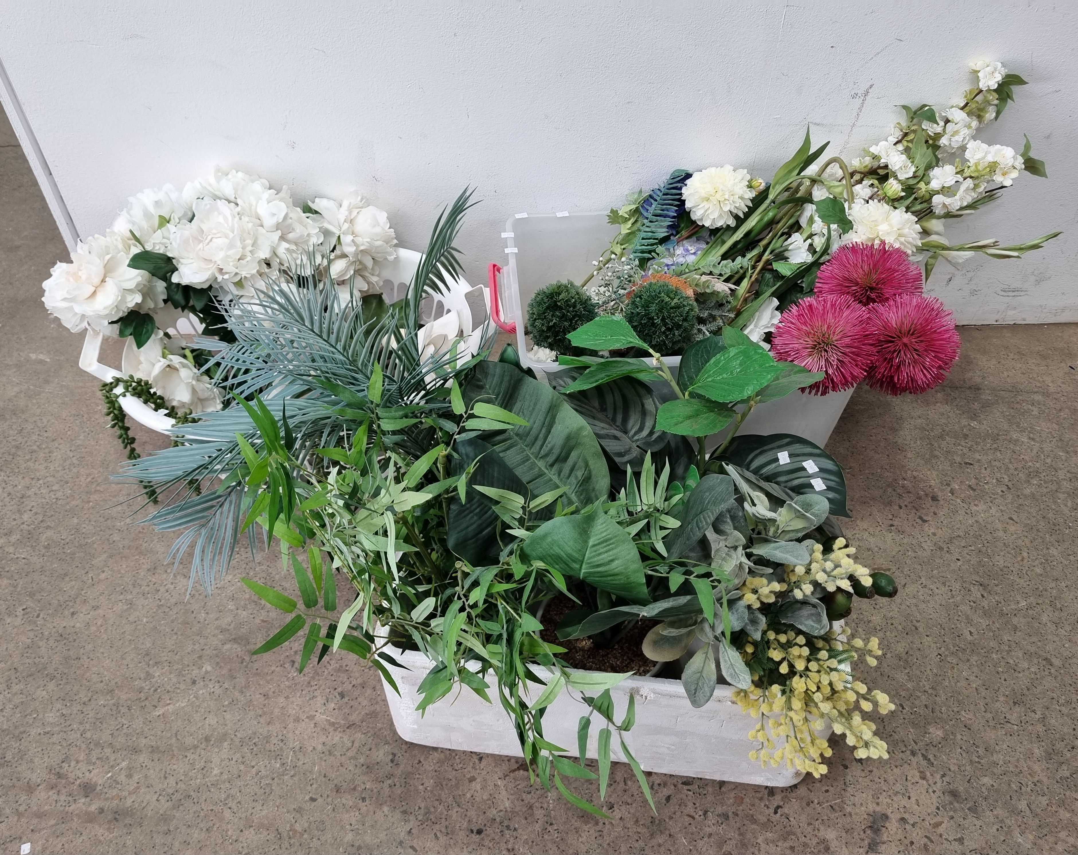 A Group Of Faux Flowers