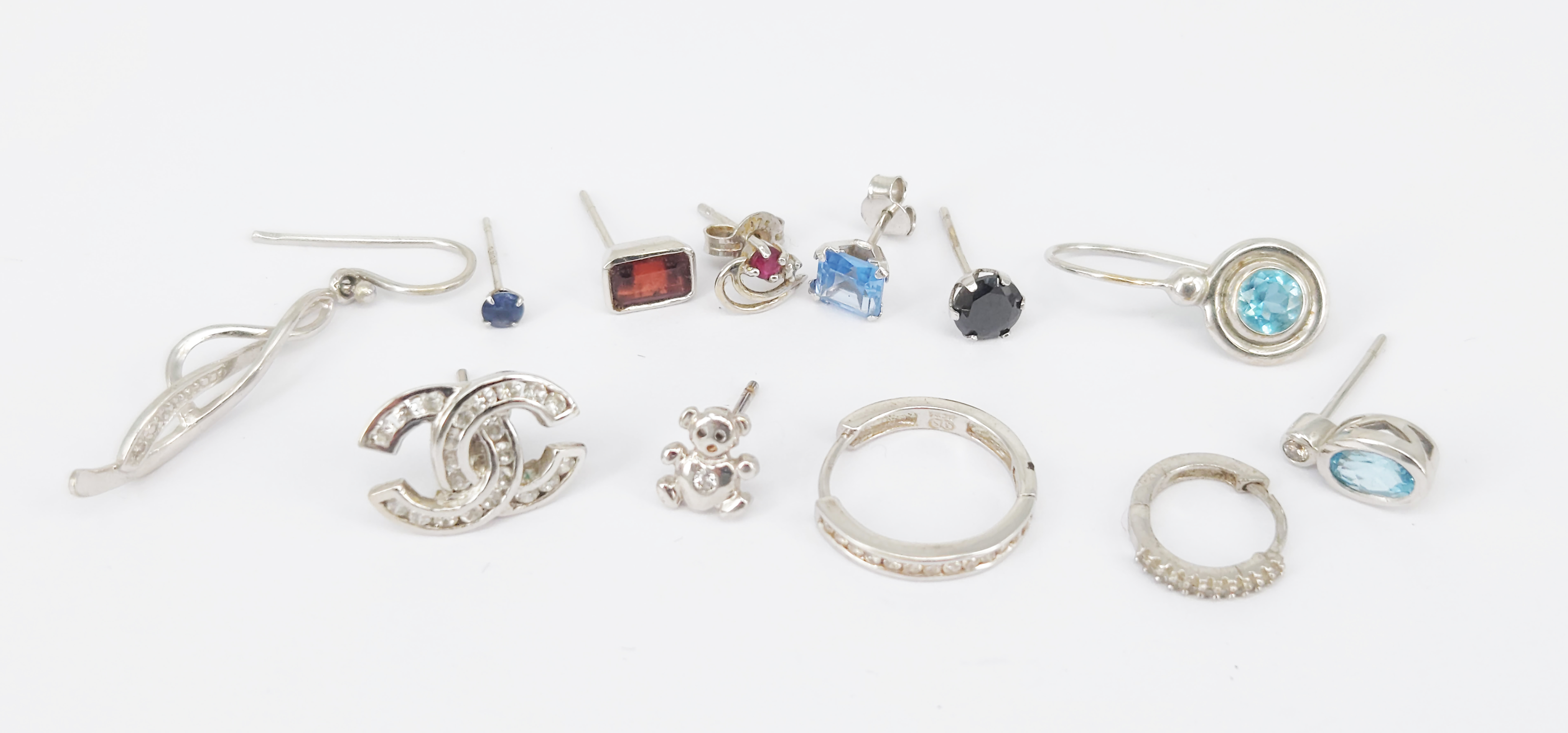 A Quantity Of White Gold And Stone-Set Single Earrings