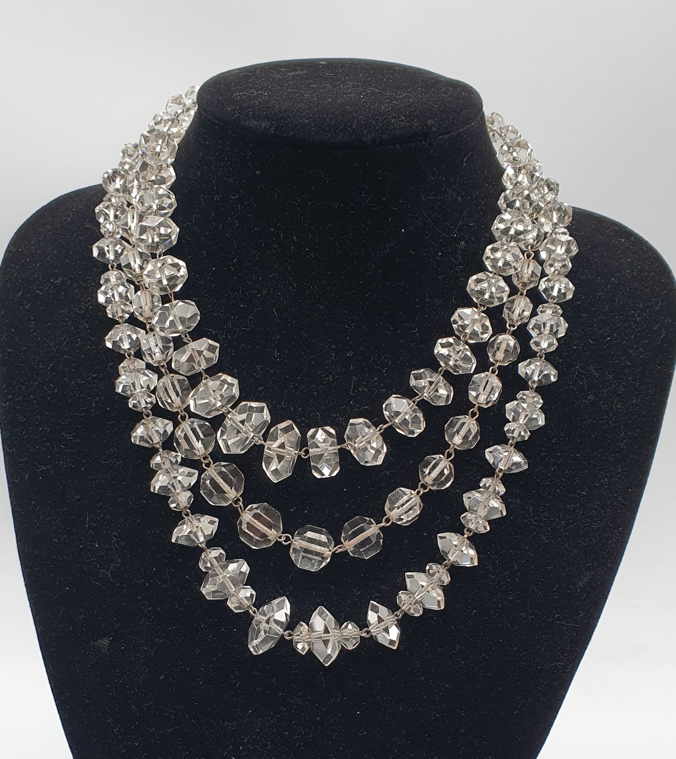 THREE ART DECO SILVER AND FACETED GLASS BEAD NECKLACES