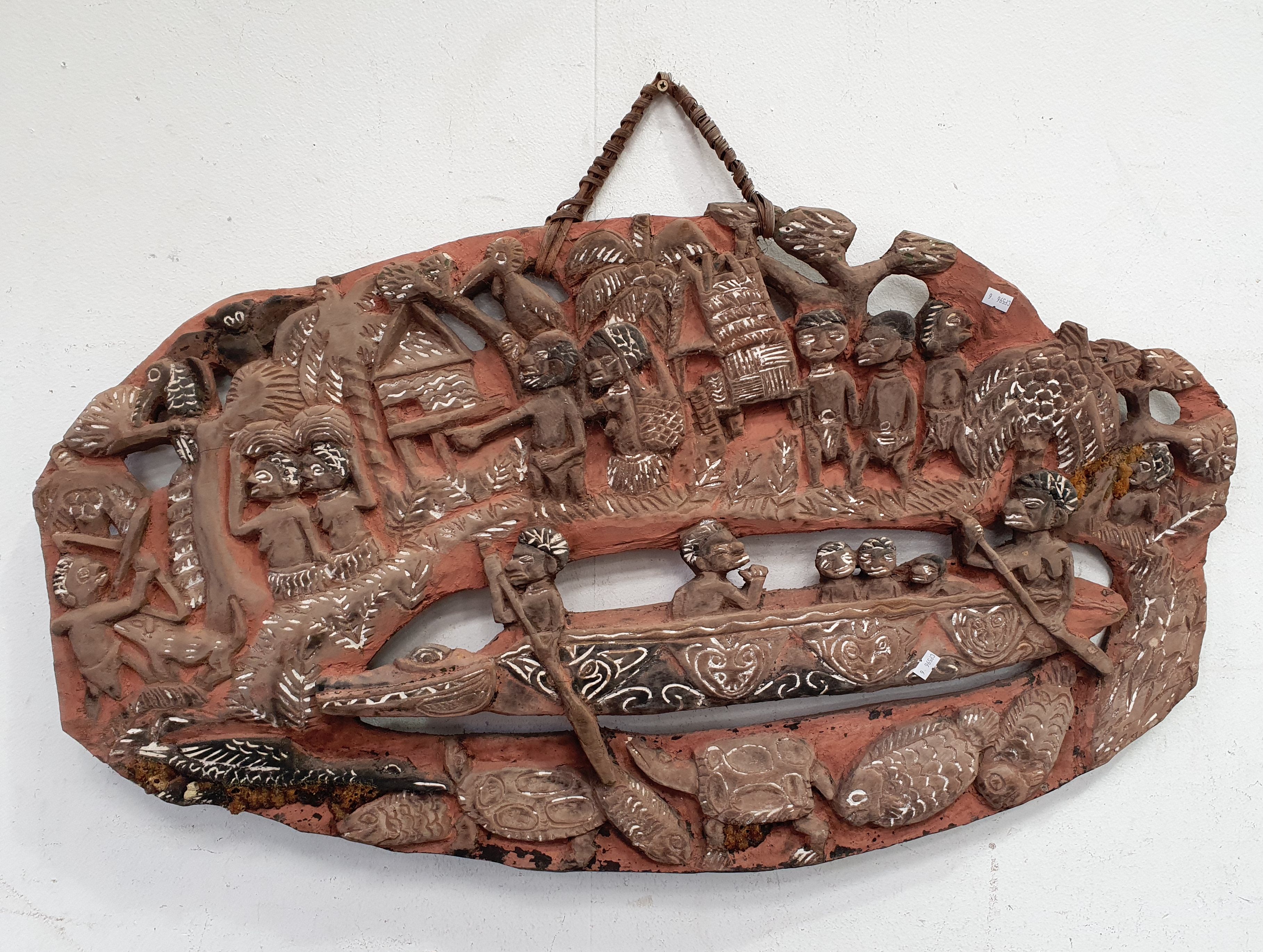 A Carved Native Wall Hanging