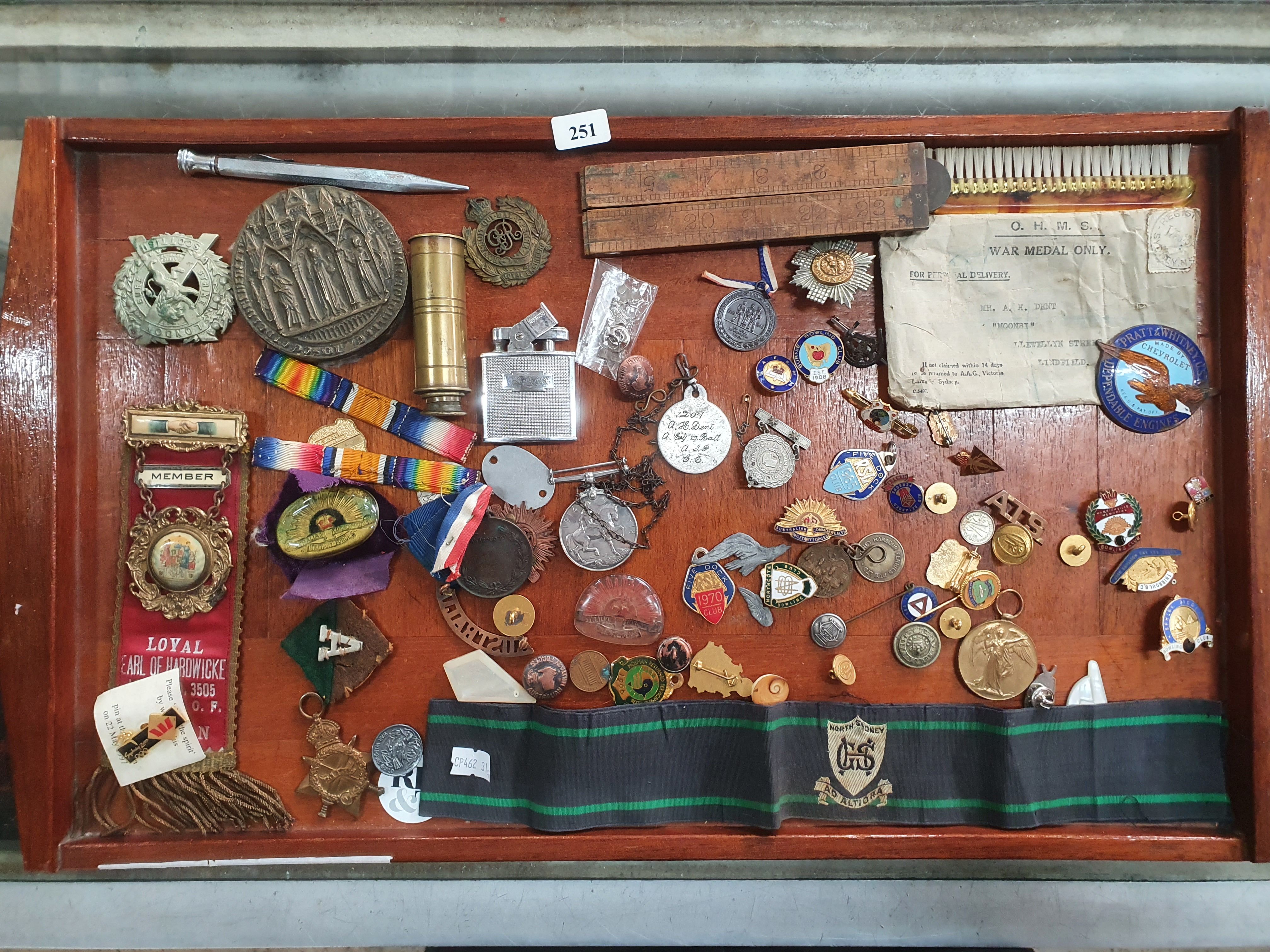 A Quantity Of Badges And Interesting Personal Effects
