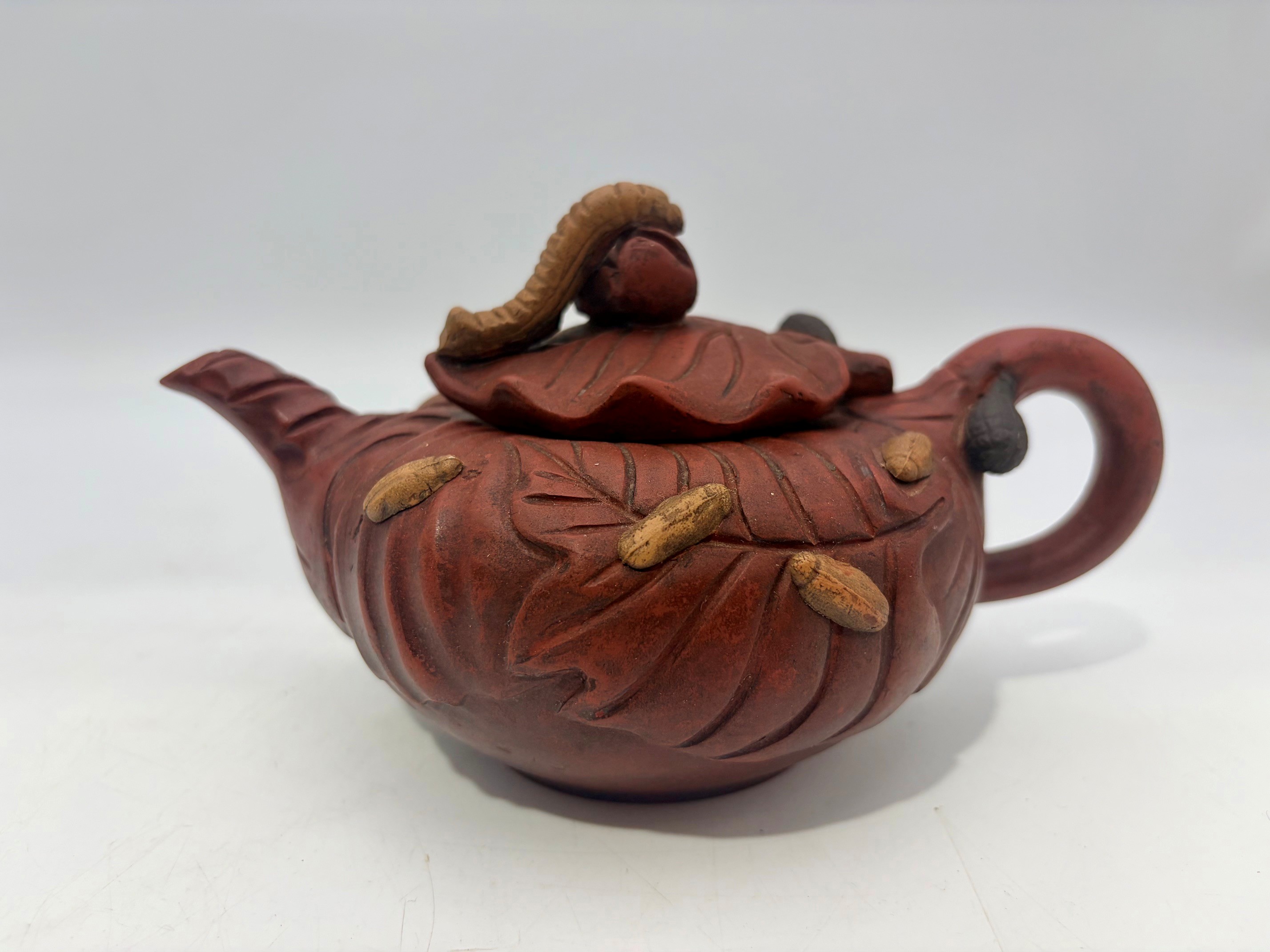 A Chinese Yixing Zisha Clay 'Hua Huo' Teapot