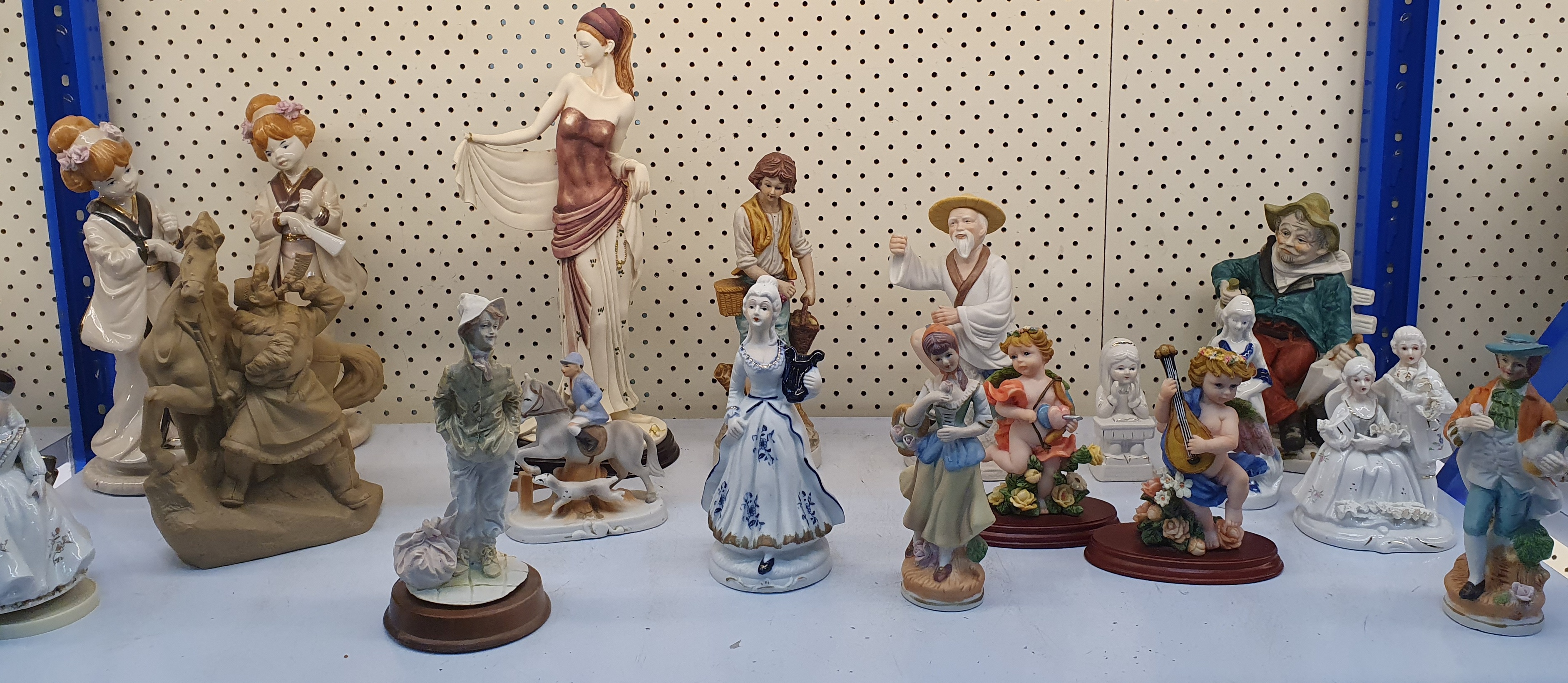 27 · A COLLECTION OF VARIOUS FIGURES