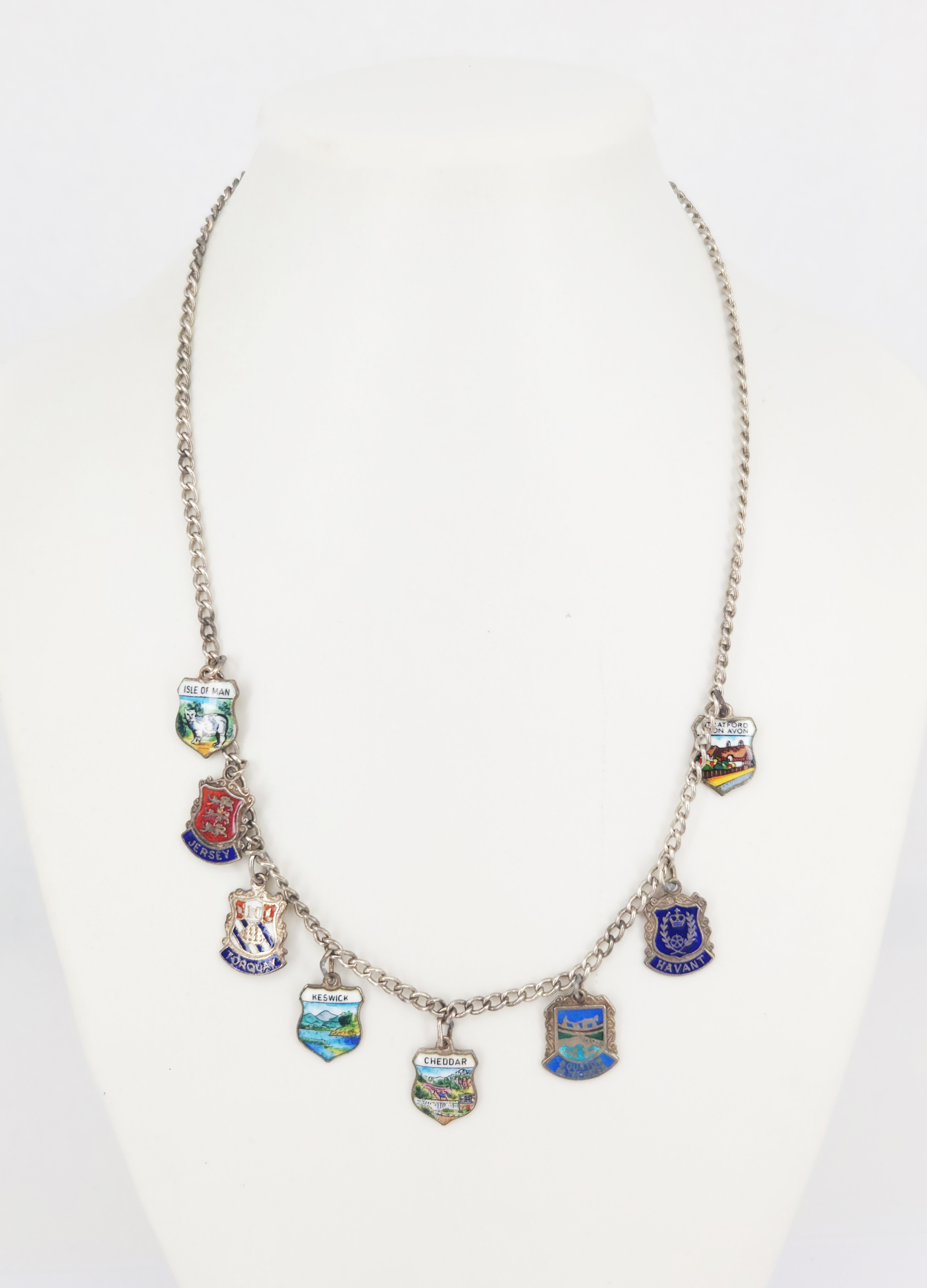 A VINTAGE ENGLISH SILVER AND ENAMEL SOUVENIR CREST NECKLACE