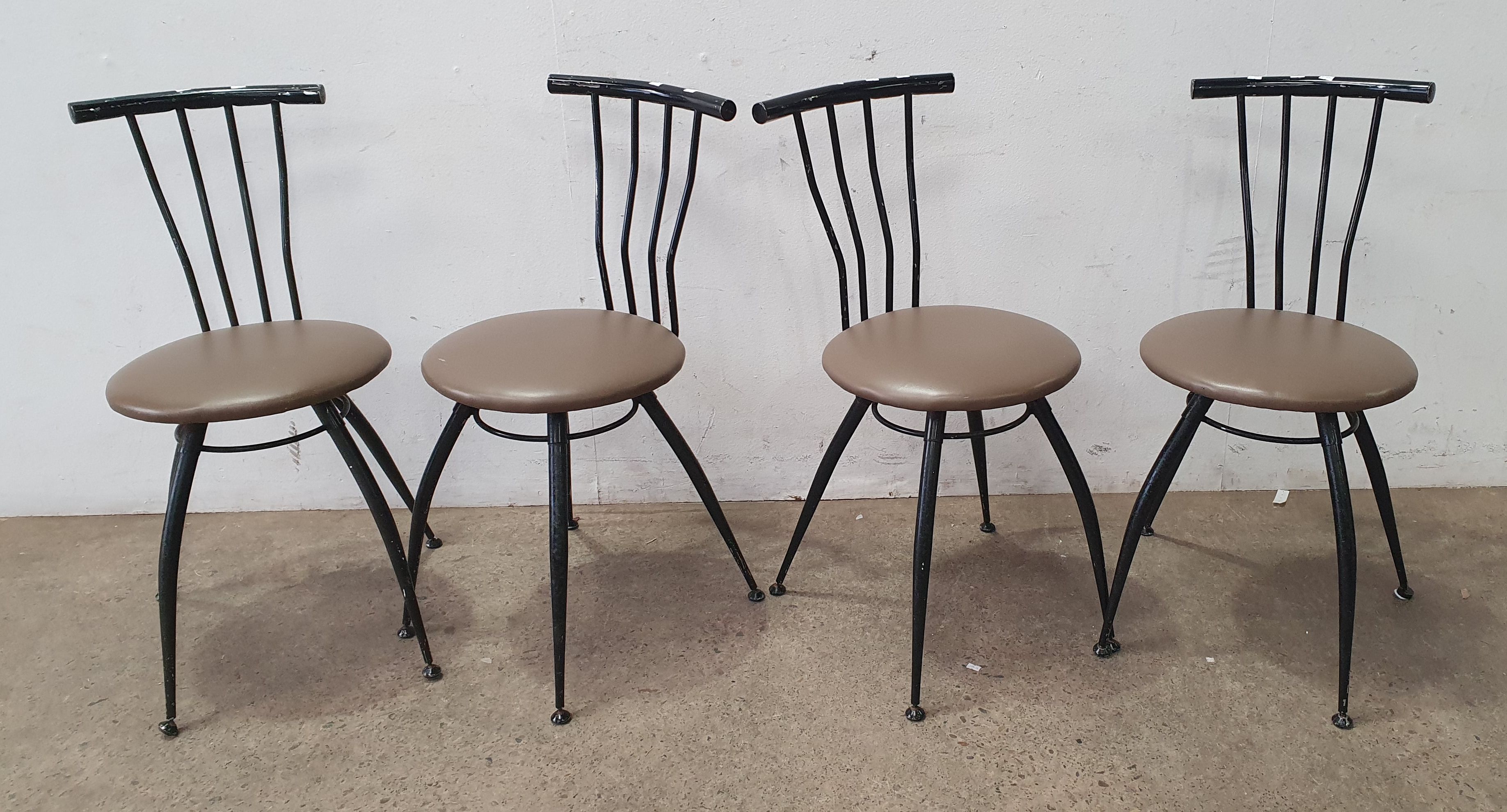 A SET OF FOUR 1970S METAL AND VINYL CHAIRS