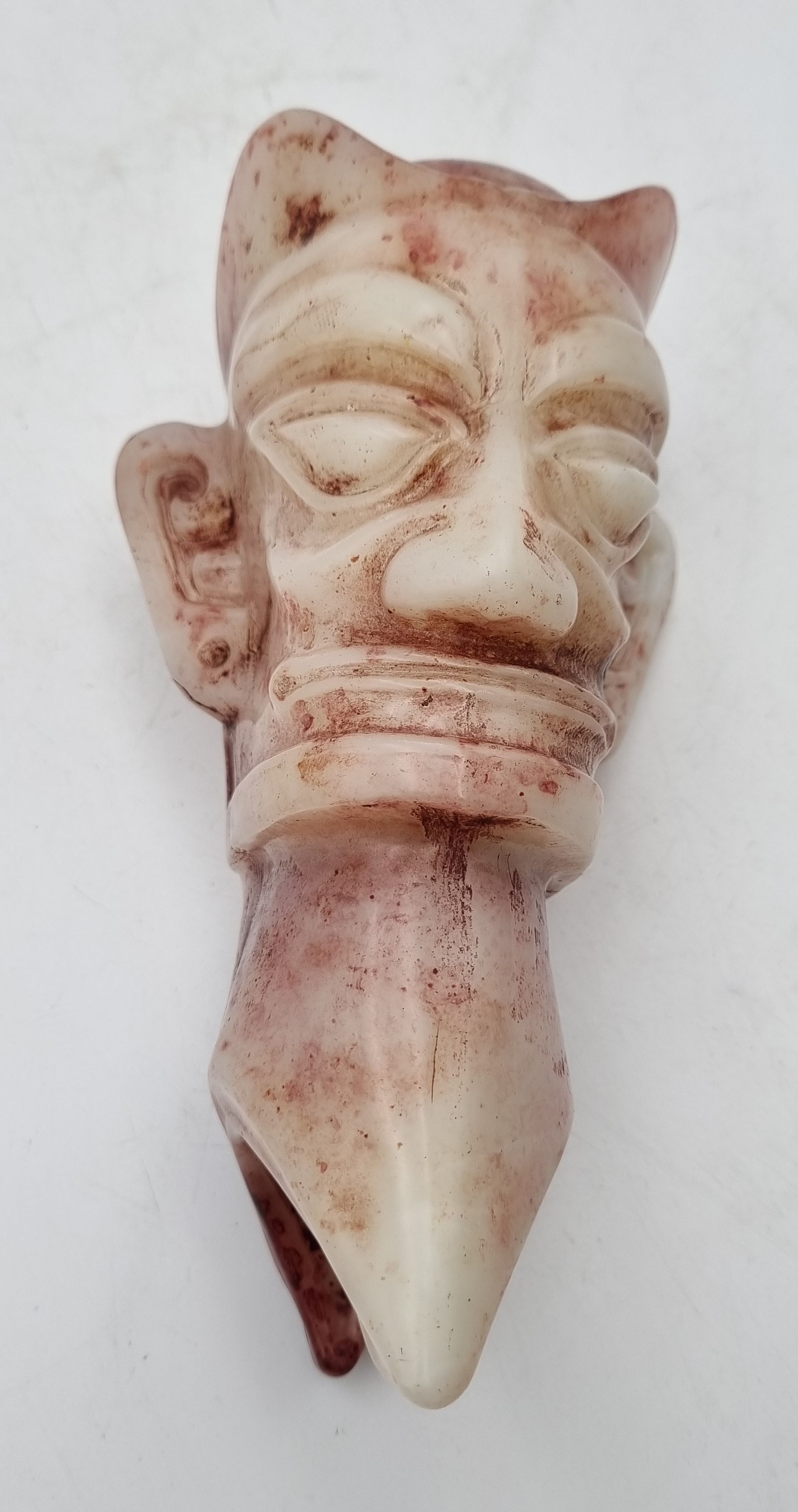 156 · A CHINESE SANXINGDUI STYLE GLASS HEAD FIGURE