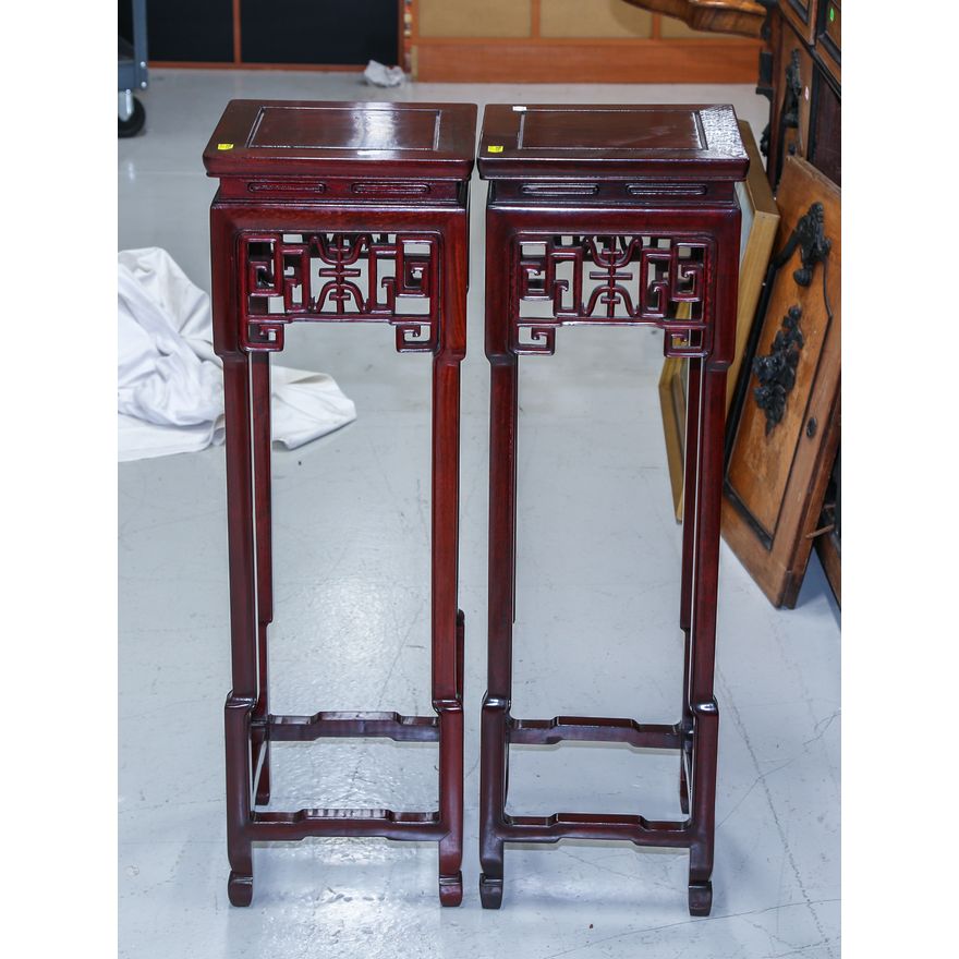 A Pair of Chinese Carved Wood Stands