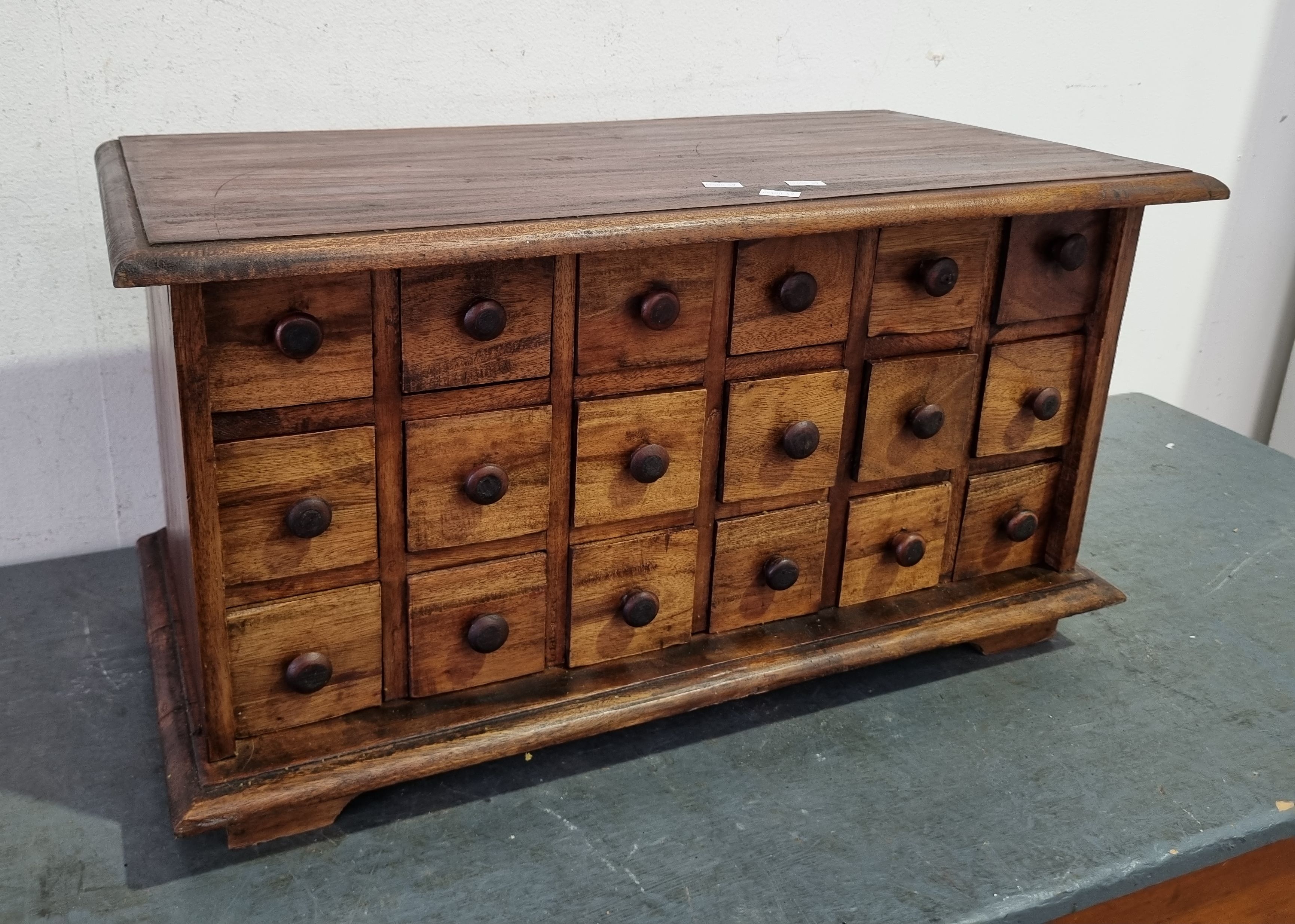 A Apothecary Style Set Of Drawers