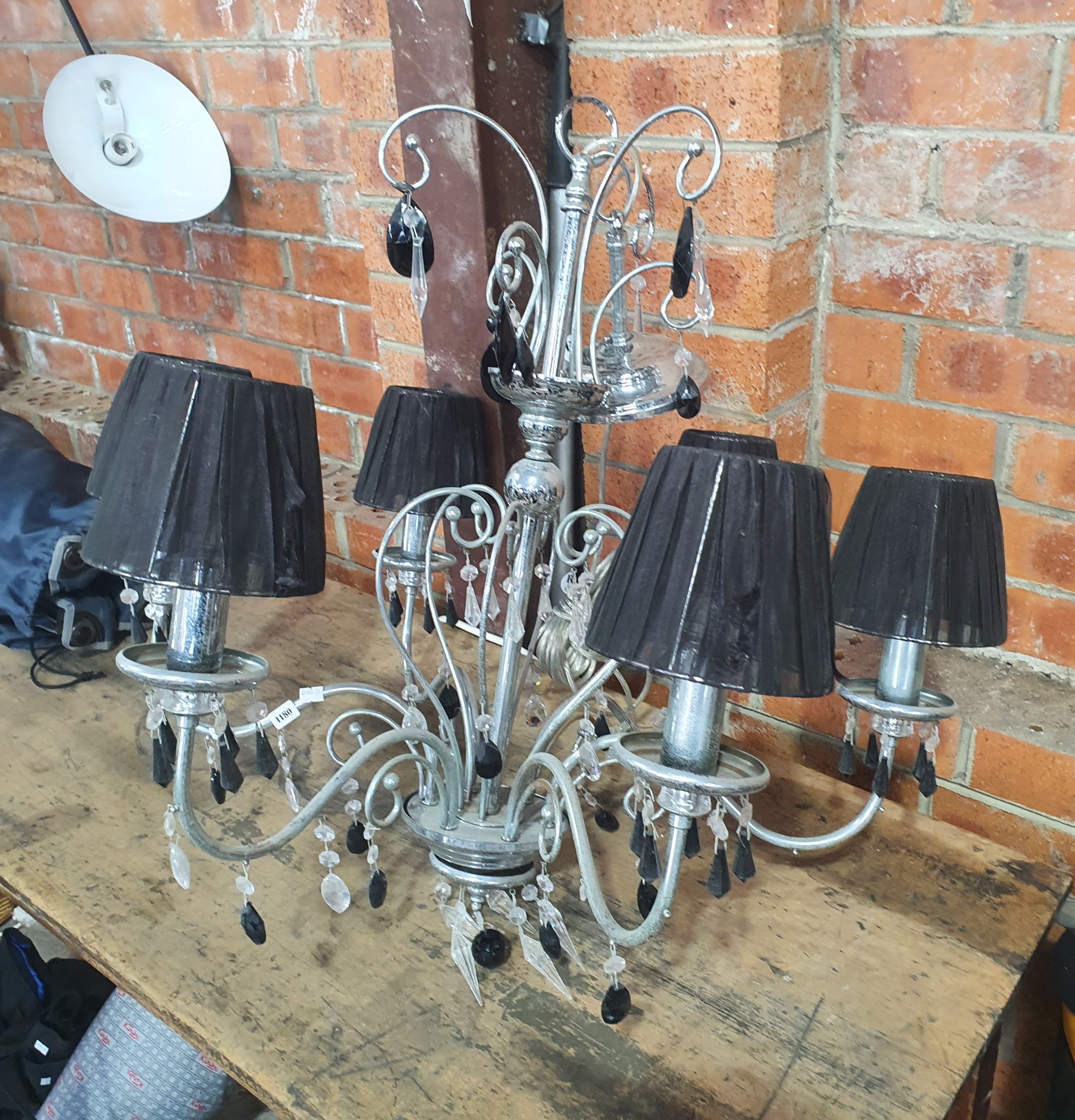 1192 · A METAL SIX BRANCH CHANDELIER