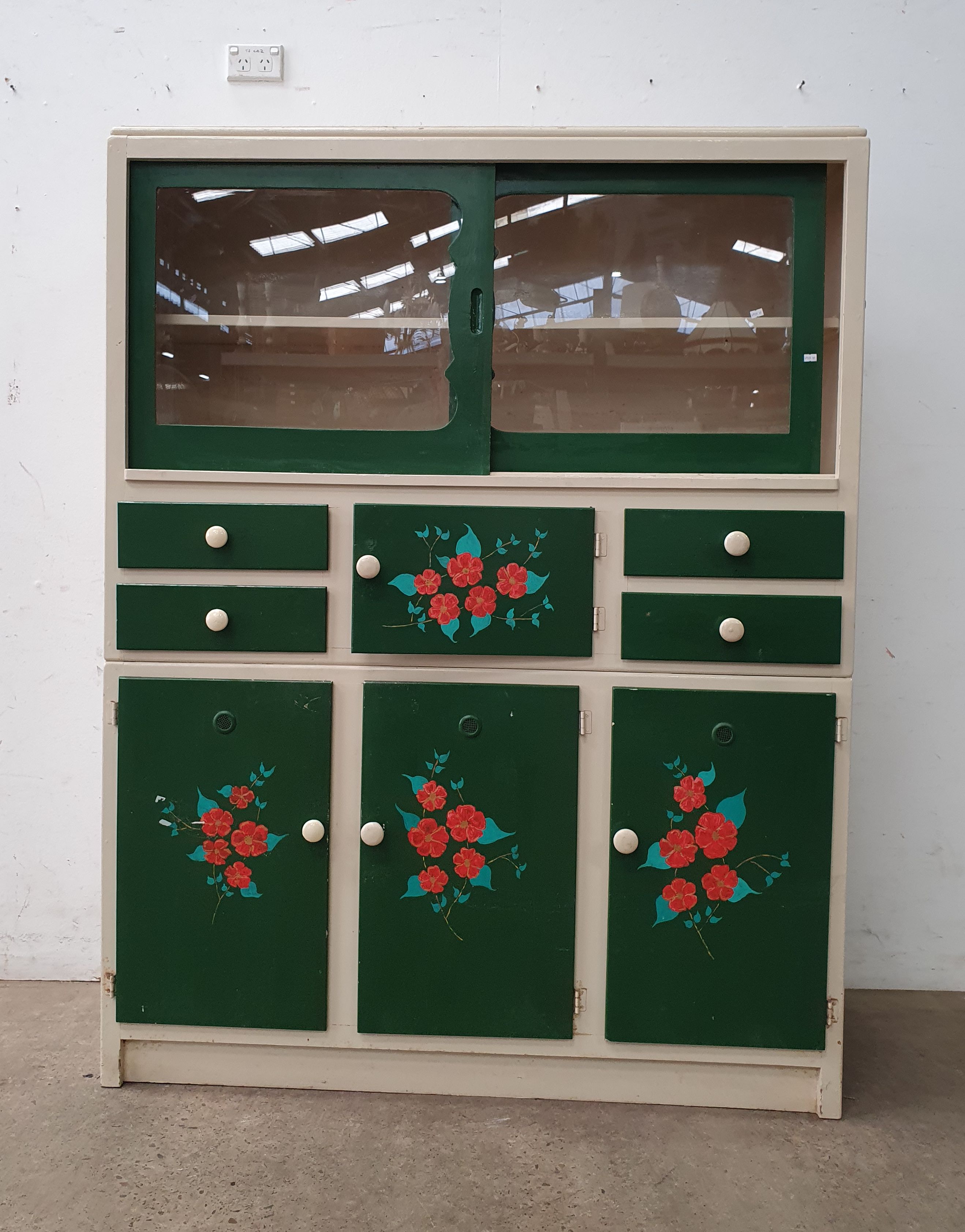 A Floral Painted Cabinet
