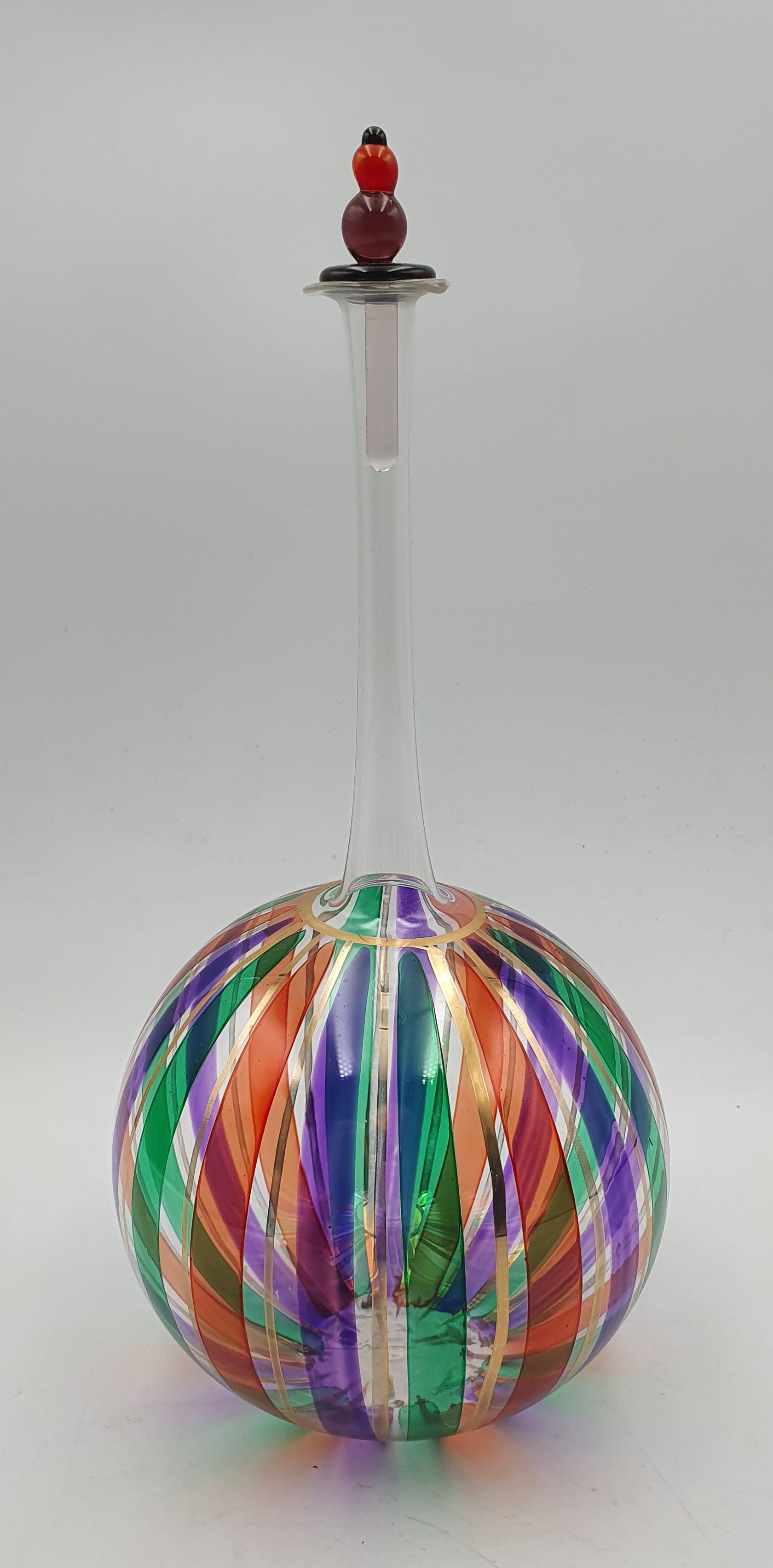 215 · A MURANO ART GLASS DECANTER/PERFUME BOTTLE WITH VERTICAL CANE DESIGN