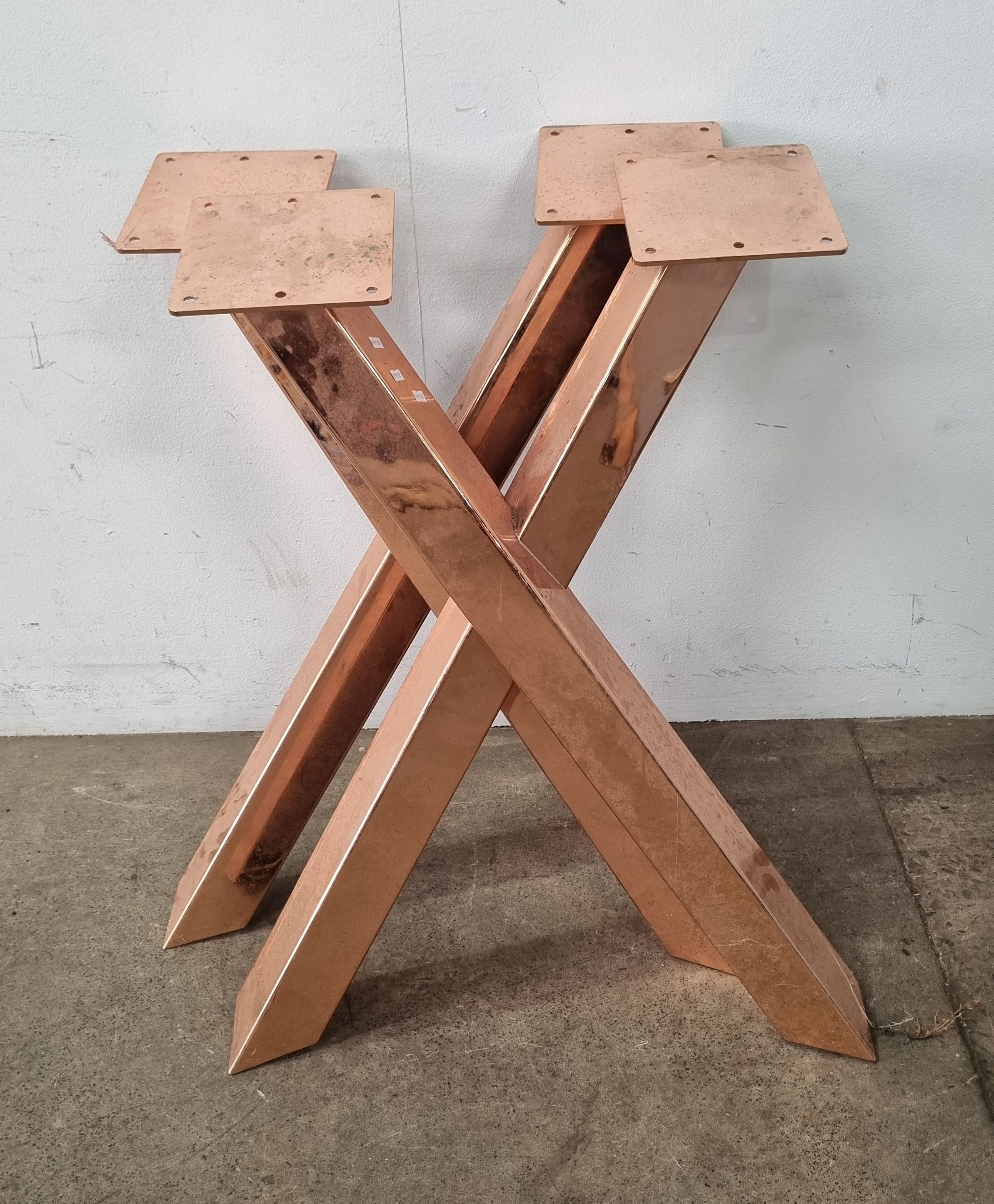 A Set Of Copper Look Legs
