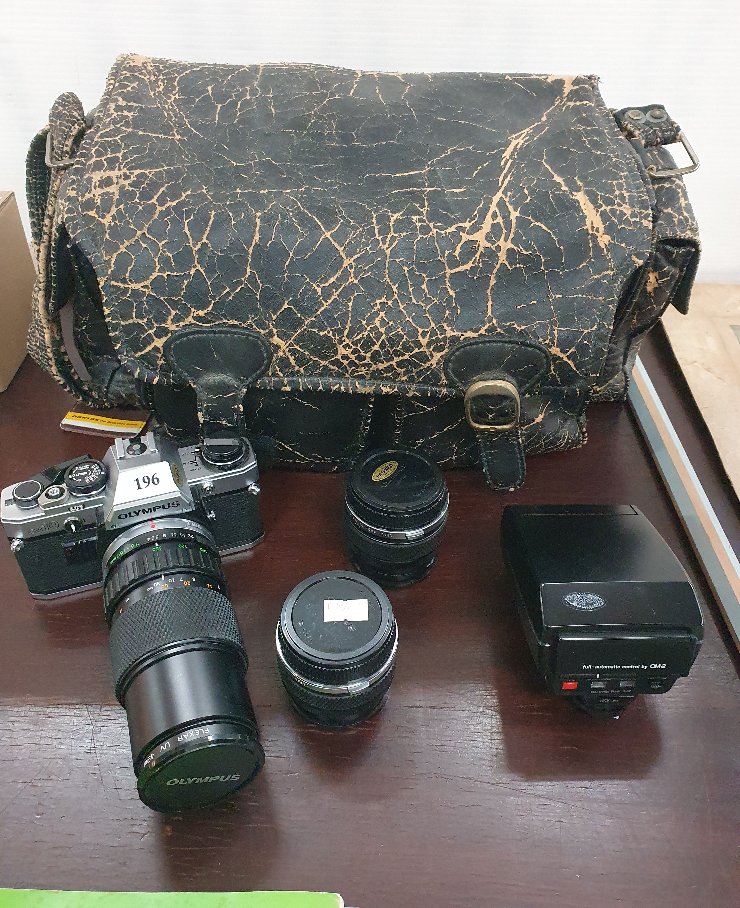 196 · AN OLYMPUS CAMERA