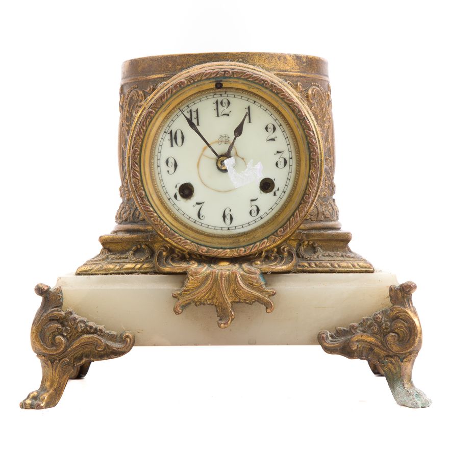 Gilt-metal and onyx mantel clock