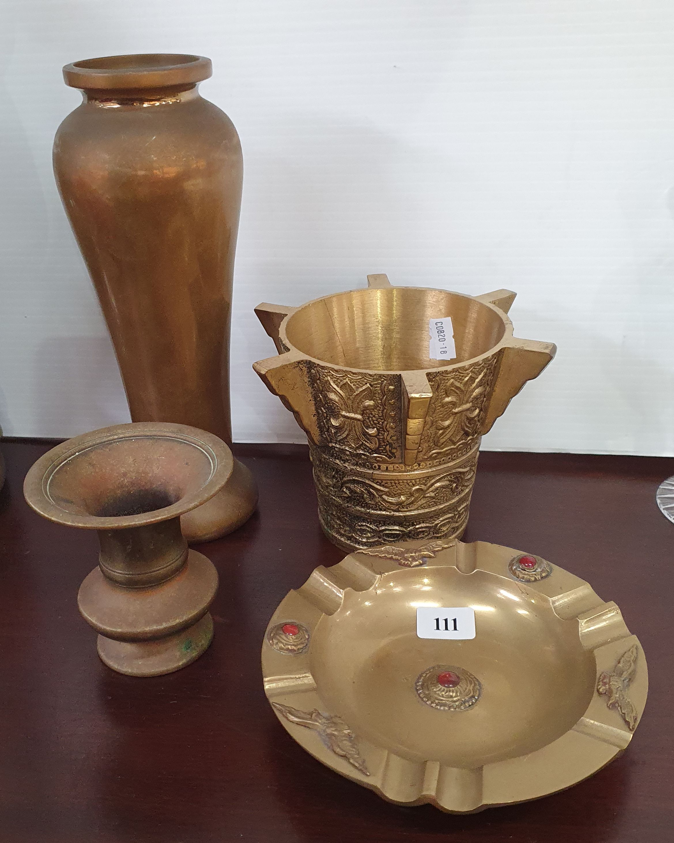111 · FOUR BRASS ITEMS
