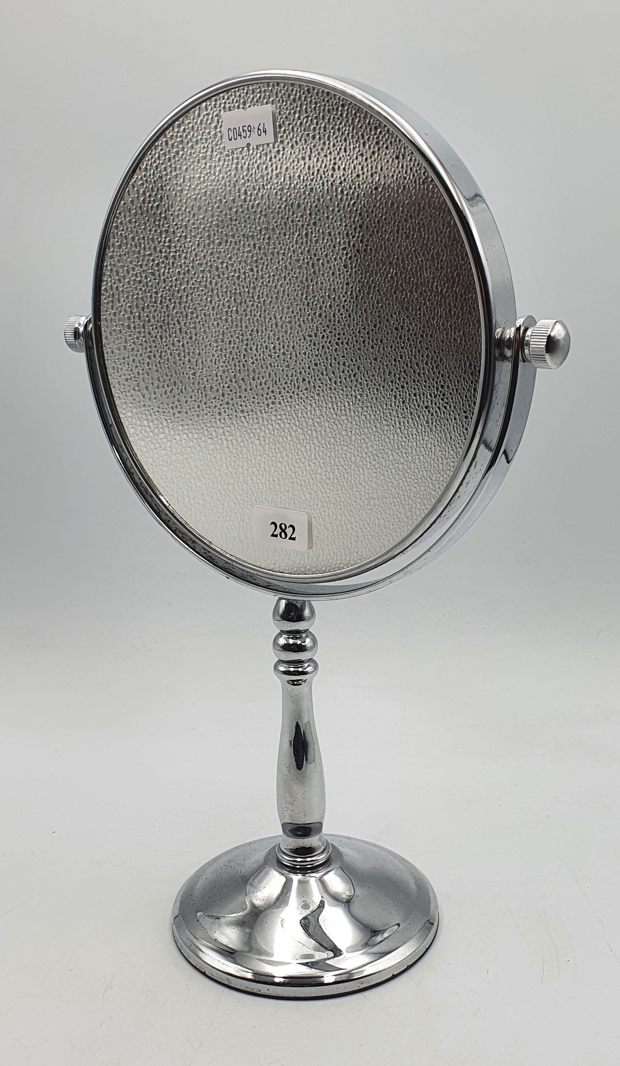 282 · A DOUBLE SIDED SHAVING/MAKE UP MIRROR ON STAND