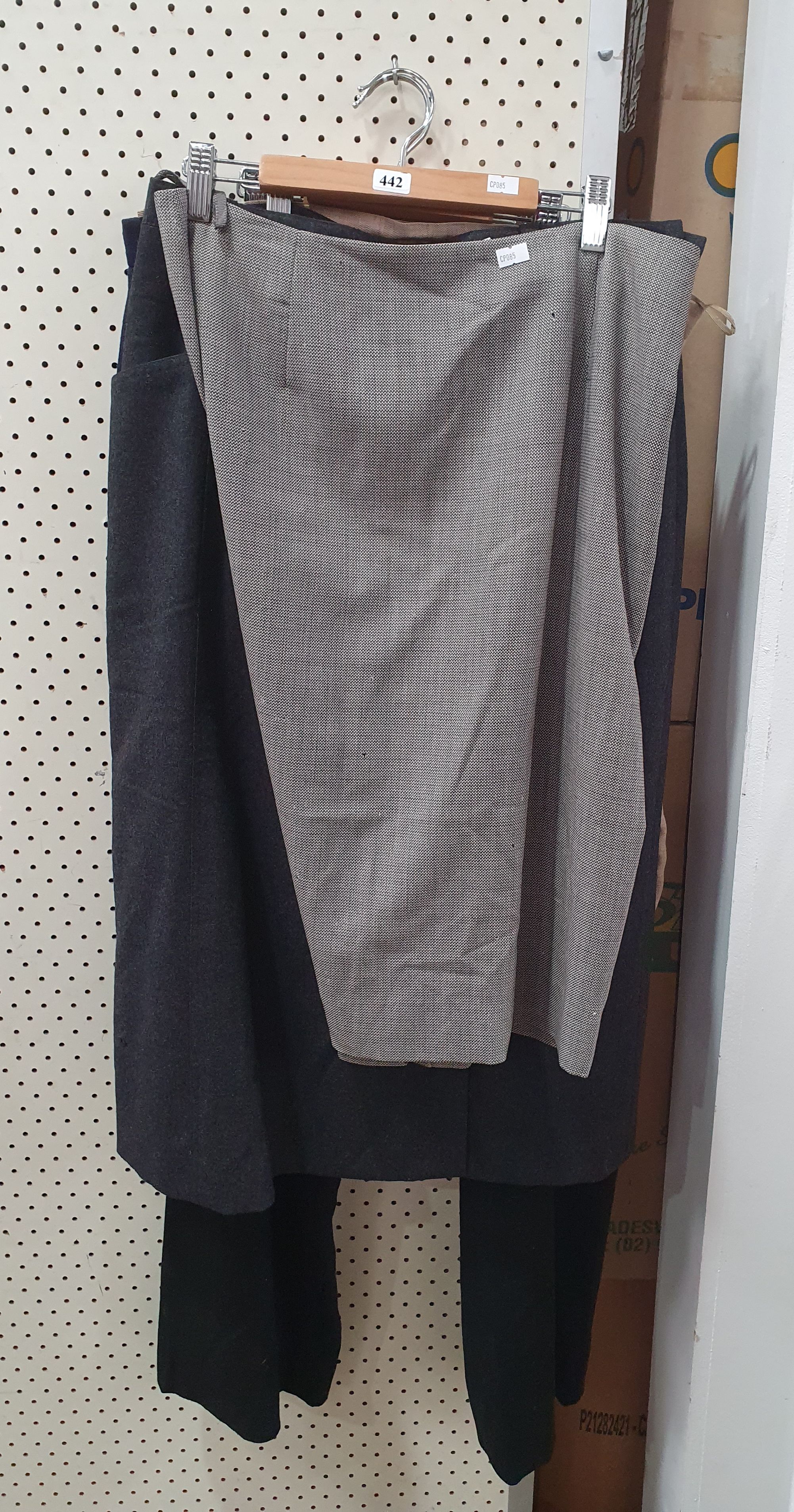 A GROUP OF WOMEN'S TROUSERS AND SKIRTS