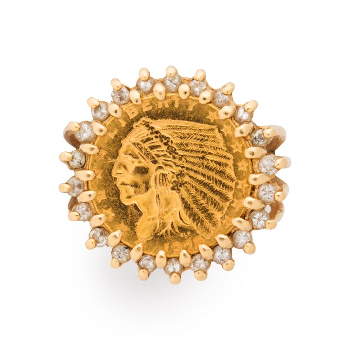 A 1928 United States 2.5 dollar and gold ring