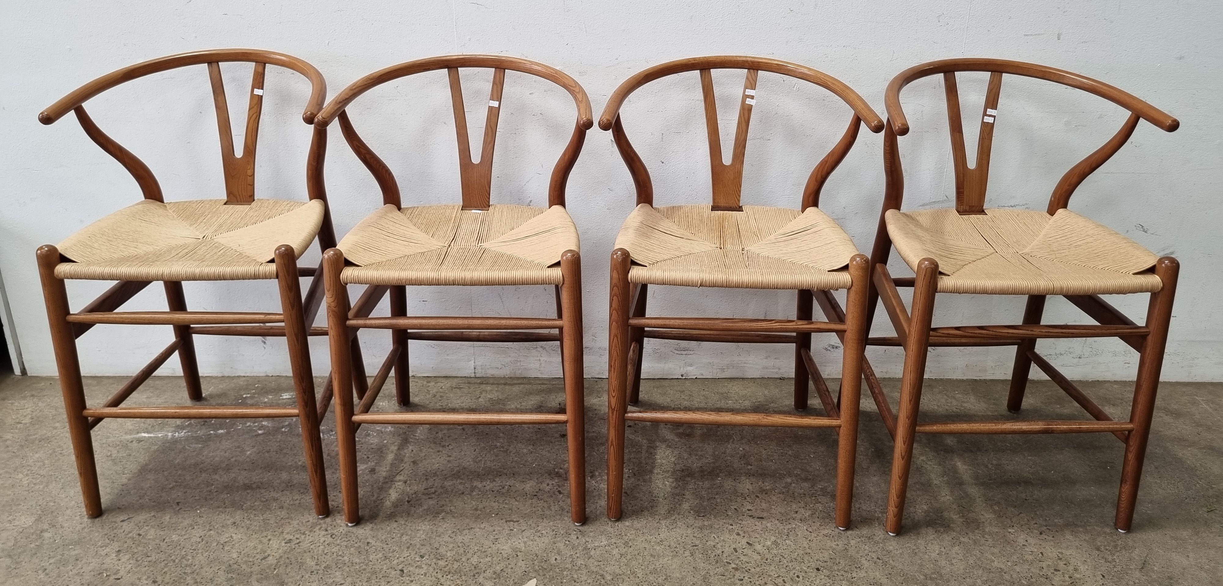 A Set Of Four Wishbone Bar Chairs