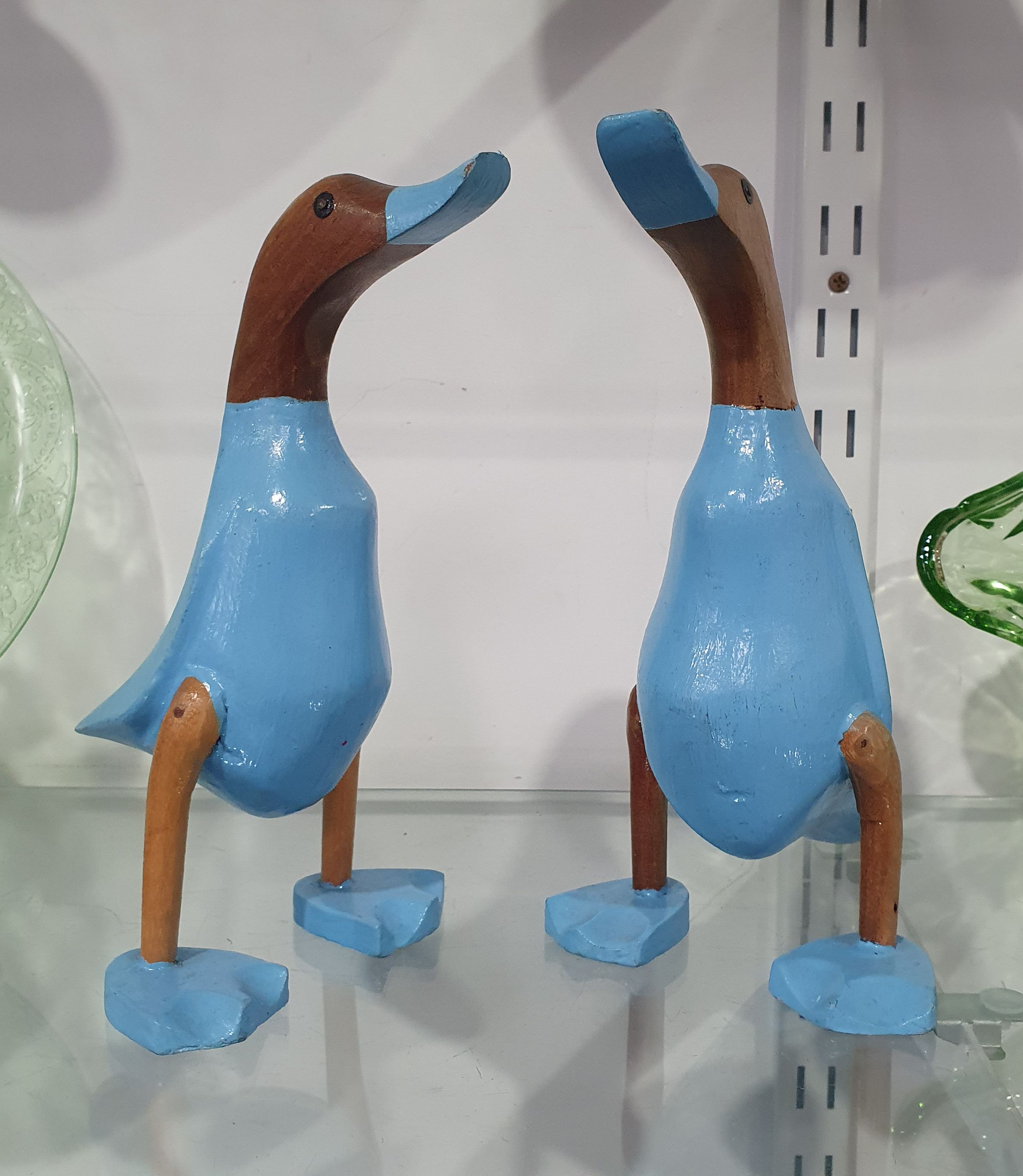 A PAIR OF TIMBER AND SKY BLUE DUCKS