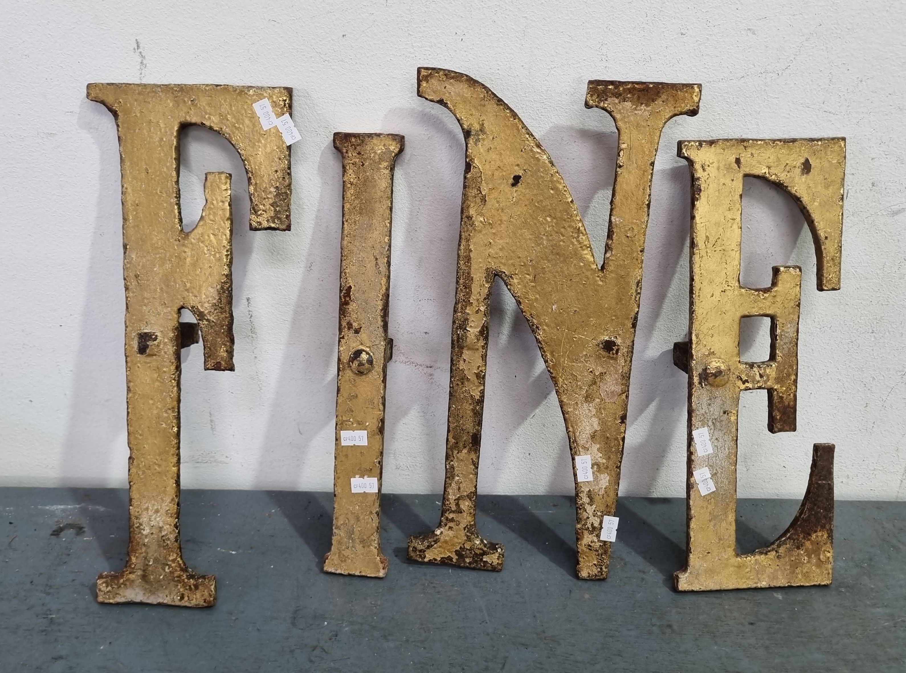 Four Heavy Cast Iron Letters