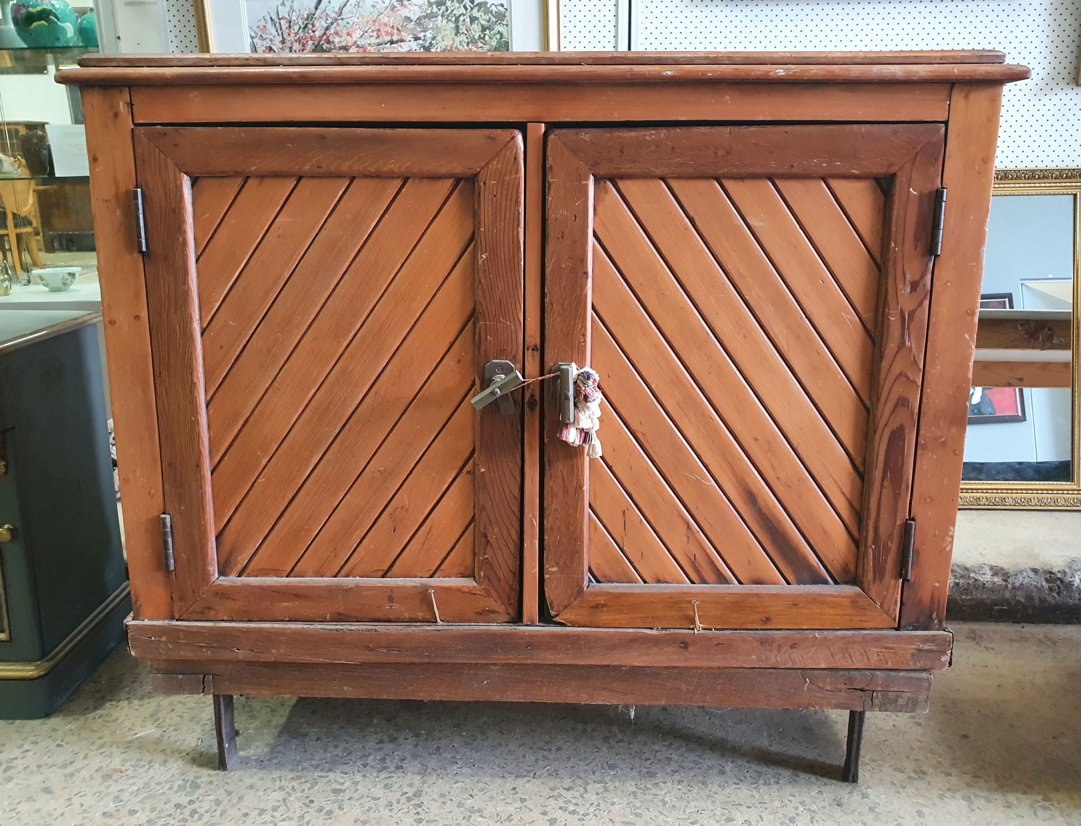 A Rustic Pine Two Door Kitchen Cabinet