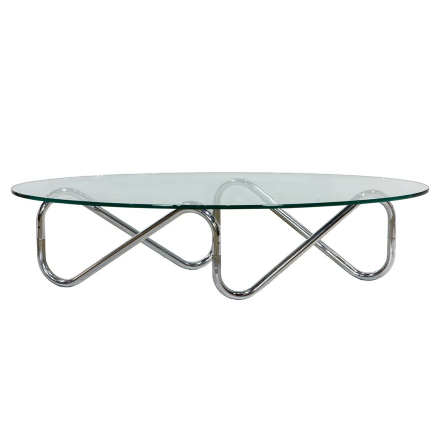 A tubular chrome and glass cocktail table