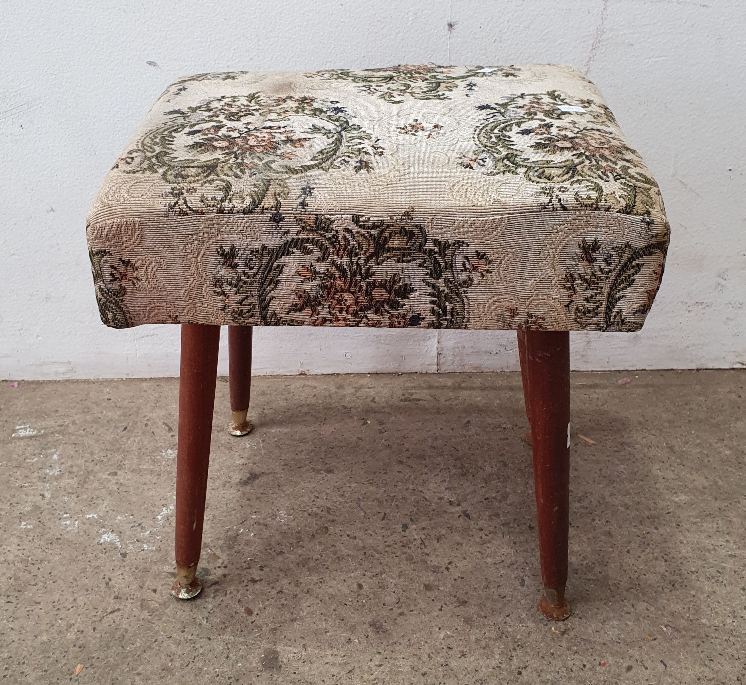 A FLORAL UPHOLSTERED STOOL