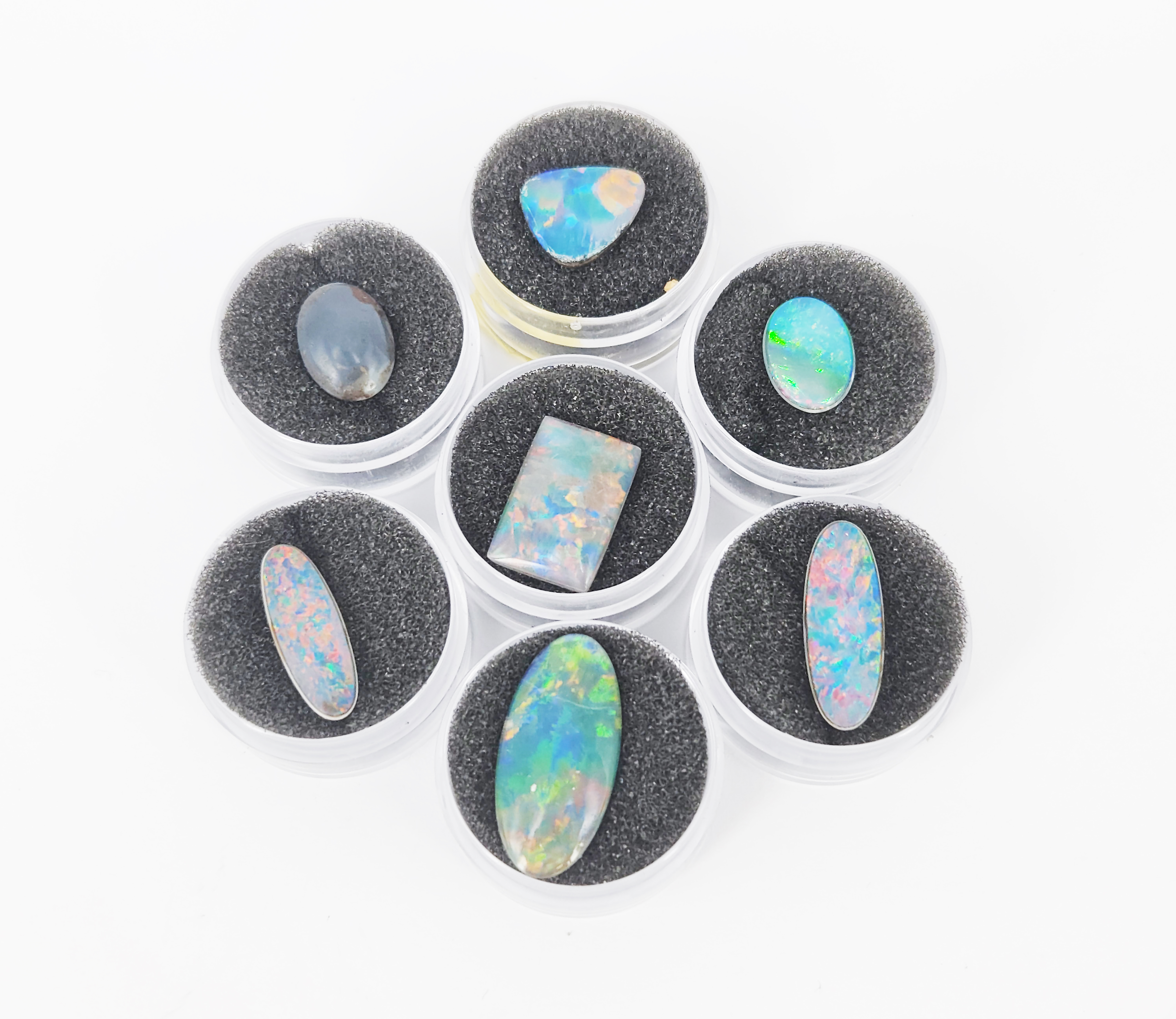 413 · SEVEN AUSTRALIAN OPAL COMPOSITE STONES