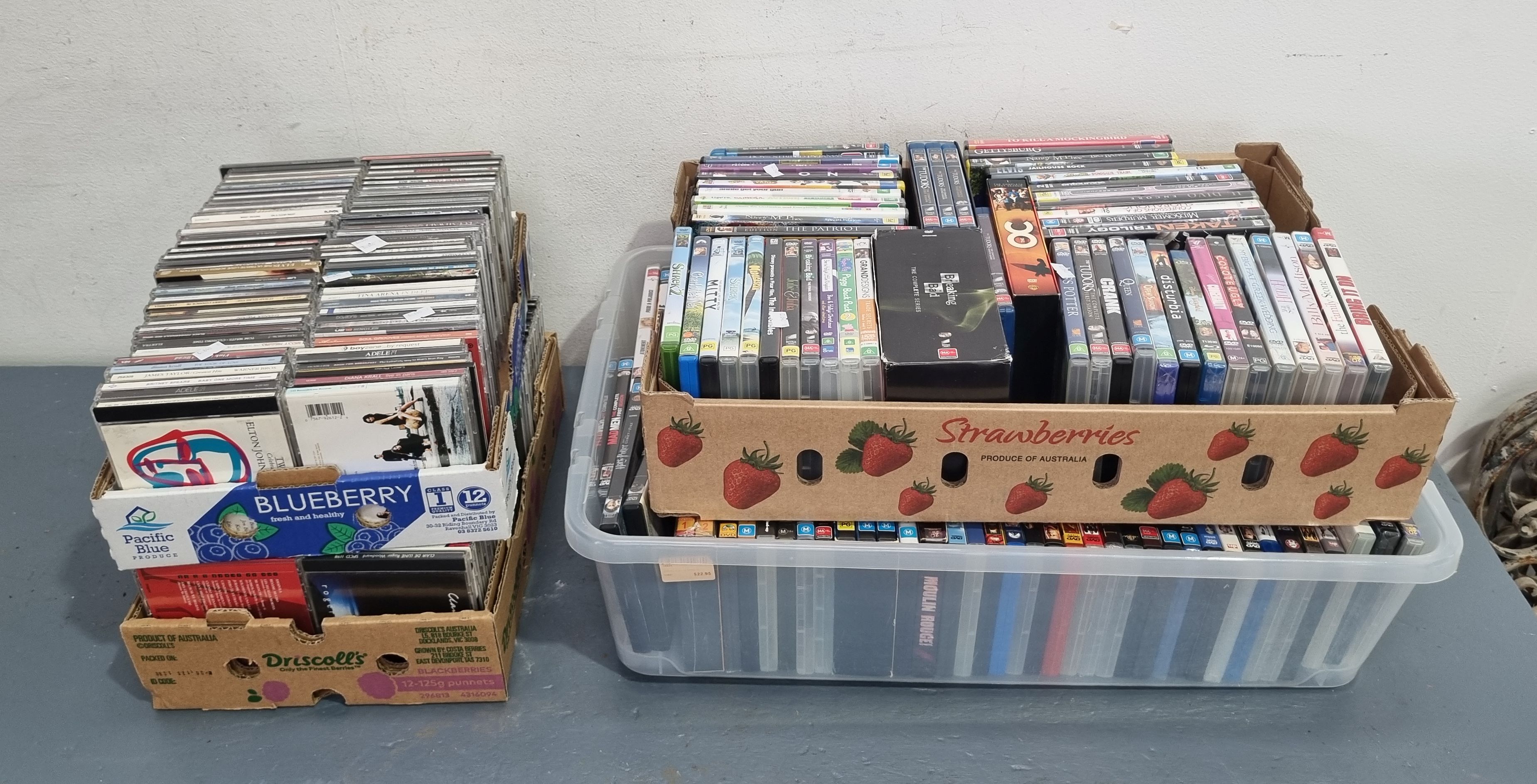 A Quantity Of Dvds And Cds