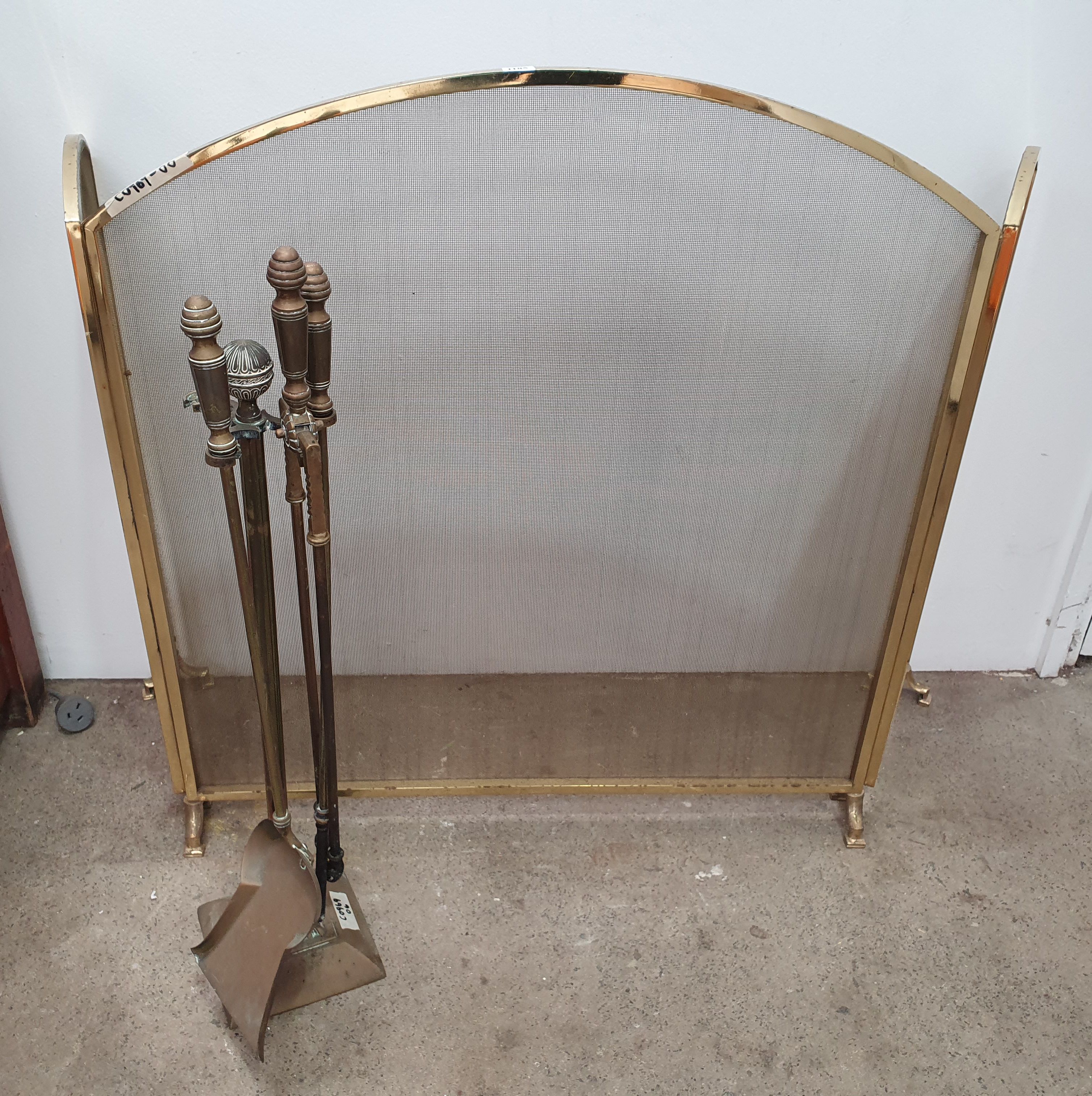 A Set Of Brass Fire Tools