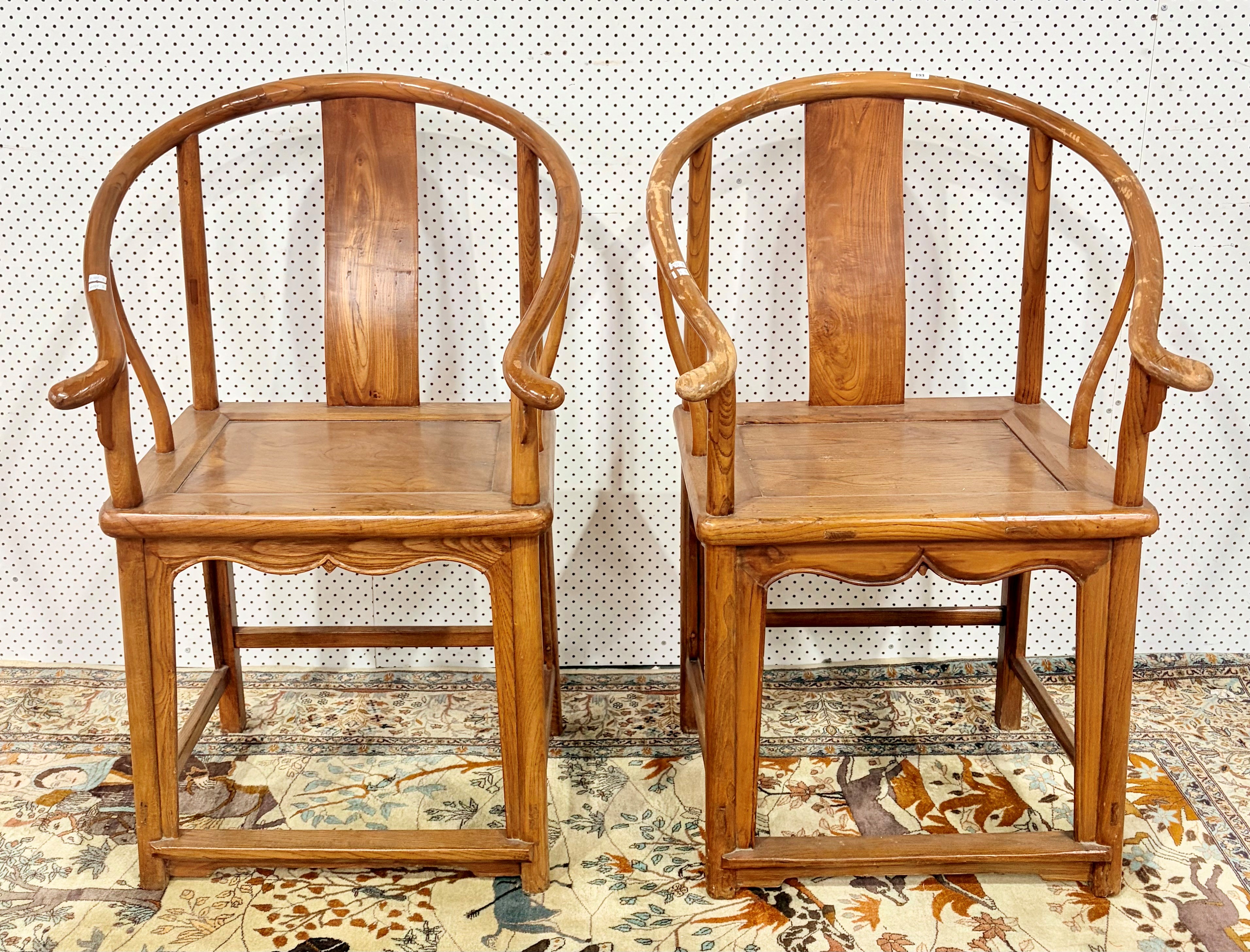A Pair Of Chinese Horseshoe Armchairs