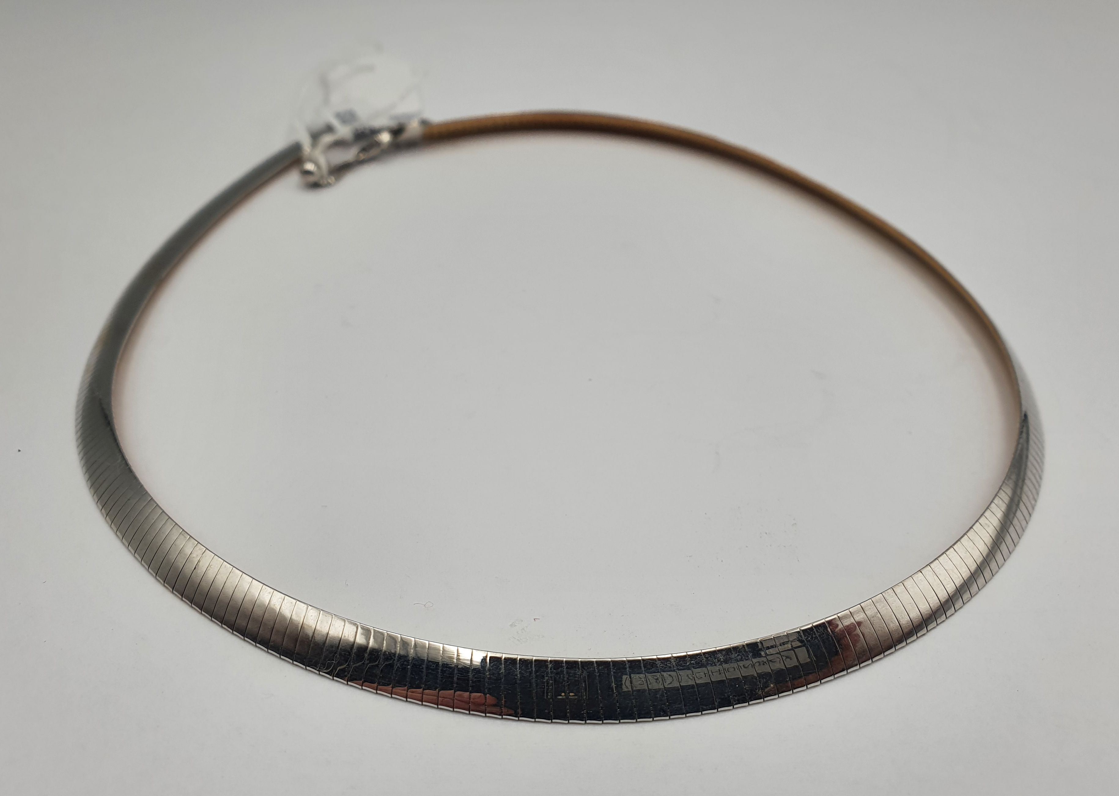 322 · A FLAT SNAKE STERLING SILVE AND 14K GOLD PLATED CHOKER NECKLACE